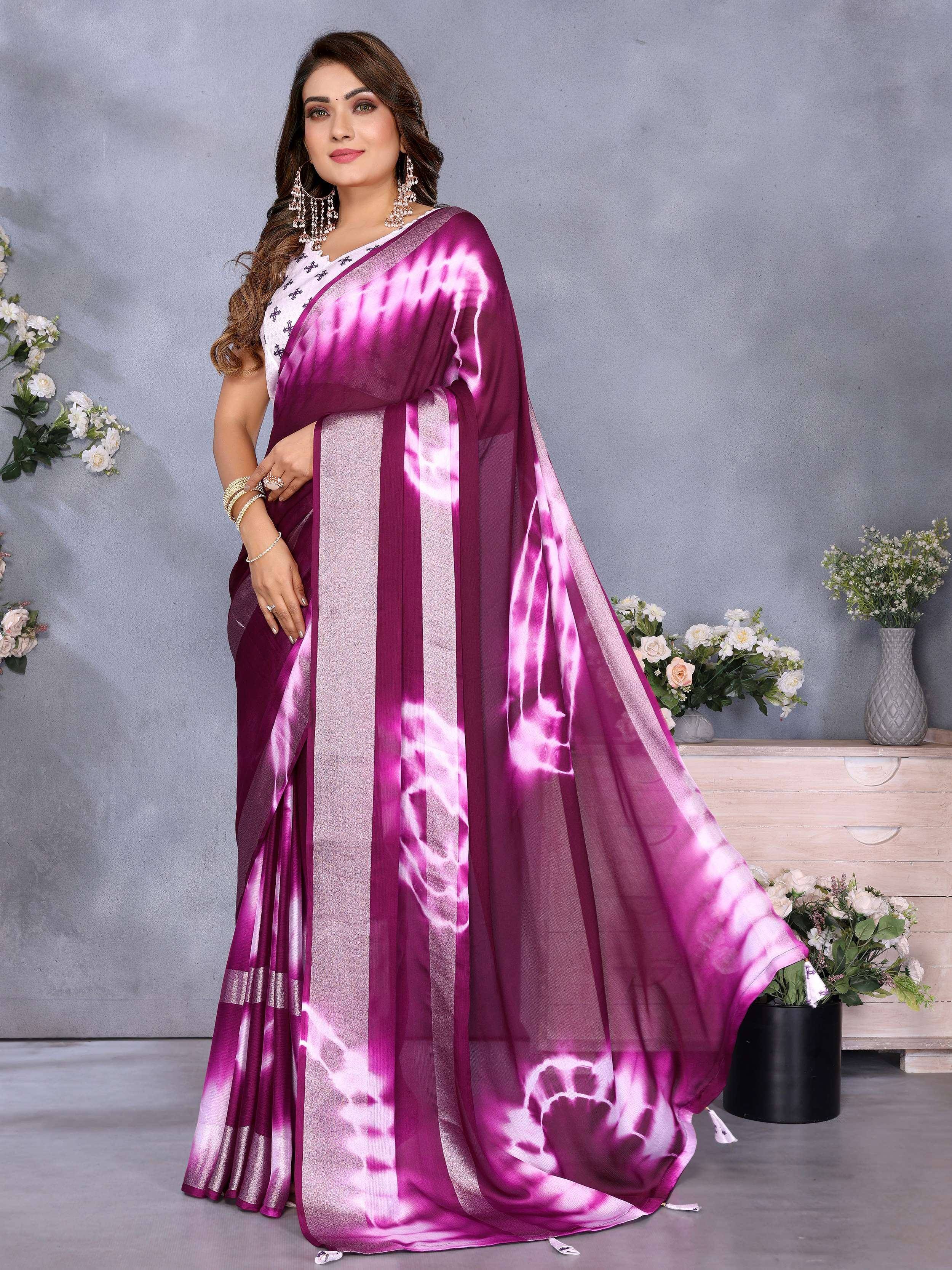 Purple tie-dye saree with silver border, styled with white embroidered blouse for Indian ethnic wear