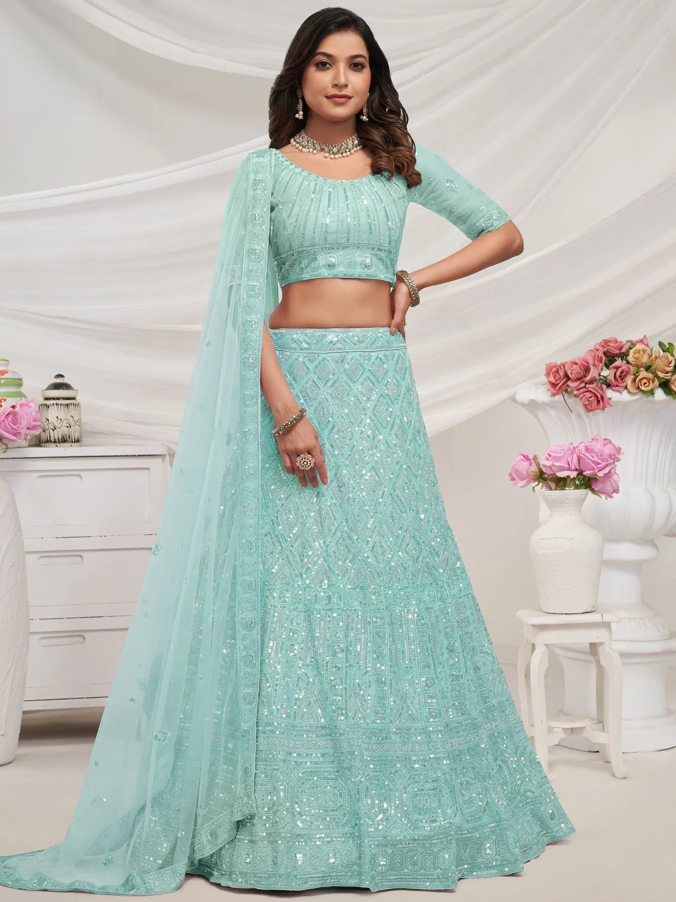 Mint green sequin lehenga choli with matching dupatta, perfect for Indian ethnic wear and festive occasions.