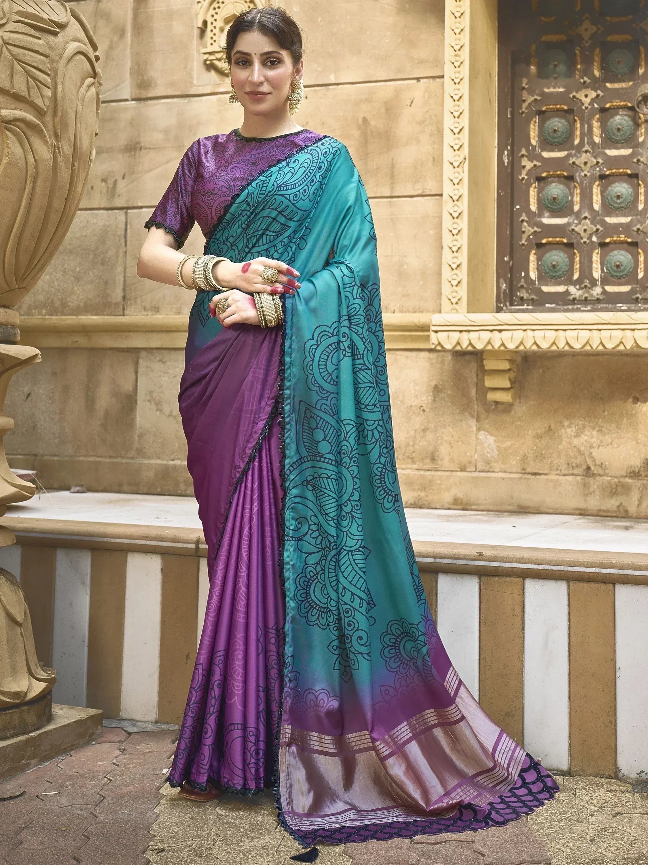 Purple and teal printed saree with intricate patterns, styled for Indian ethnic wear