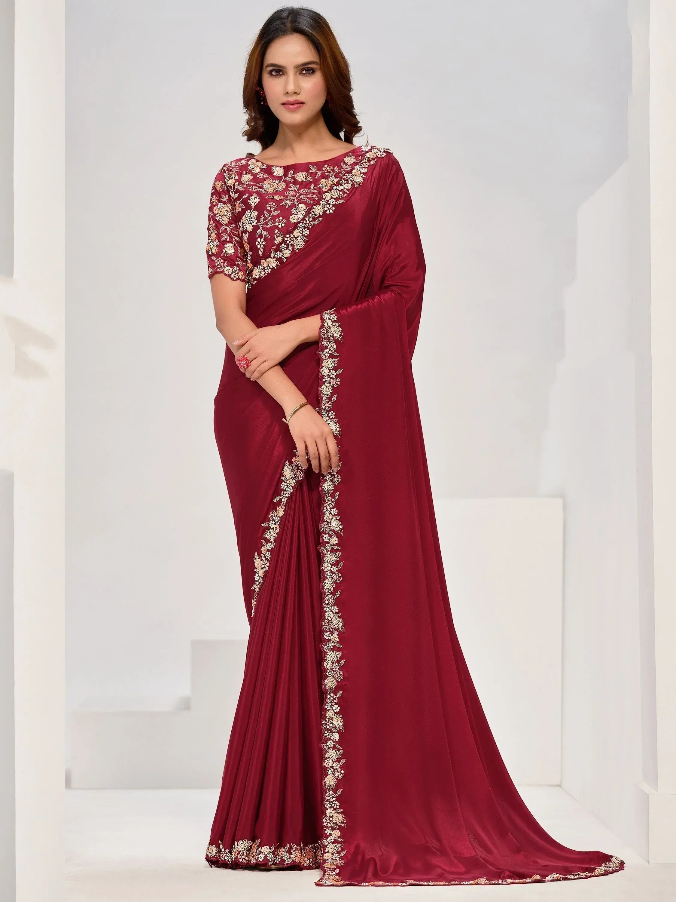 Elegant maroon saree with gold floral embroidery, perfect for Indian ethnic occasions