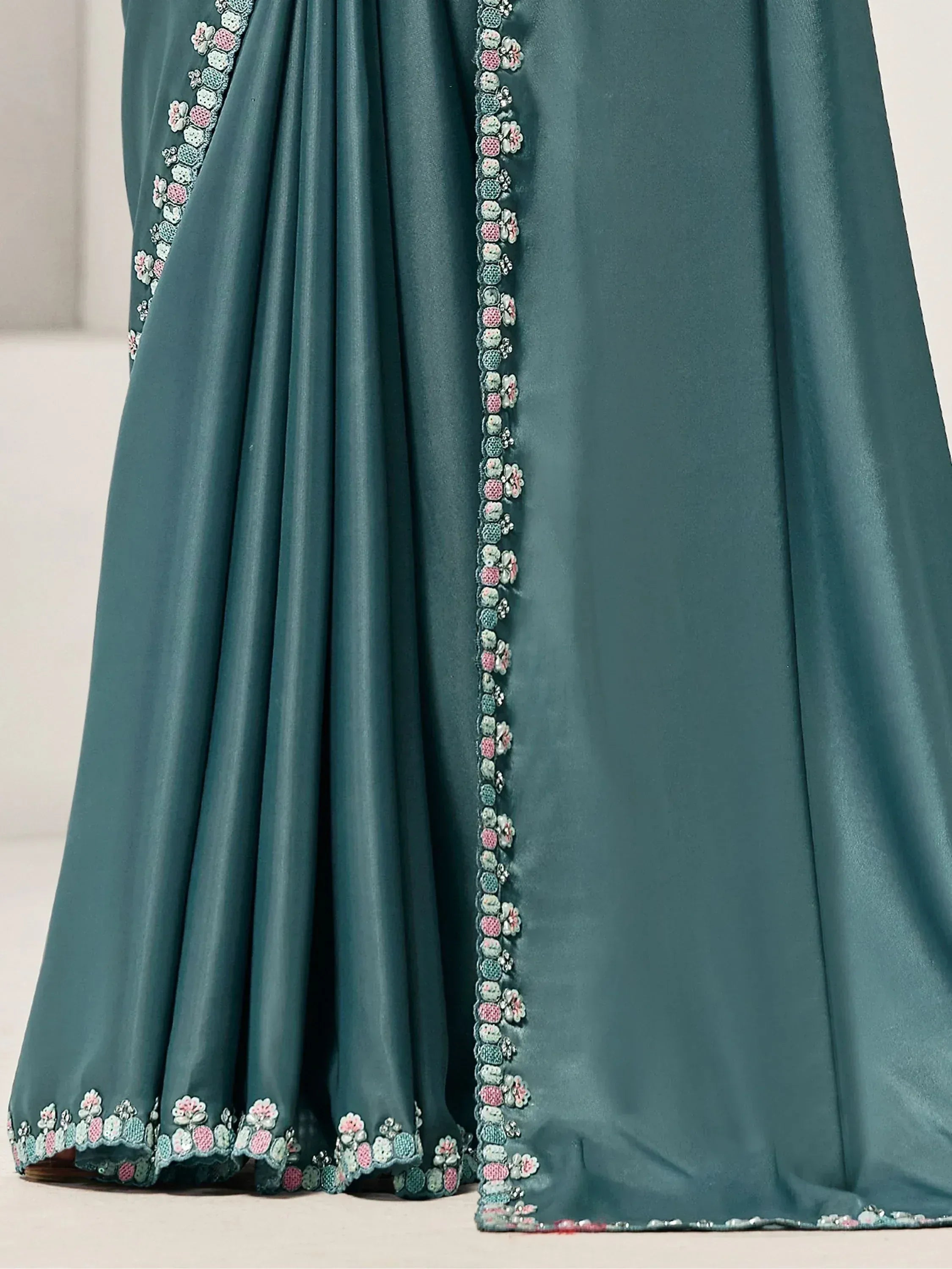 Teal ethnic gown with floral embroidery, perfect for Indian occasions and festive wear.