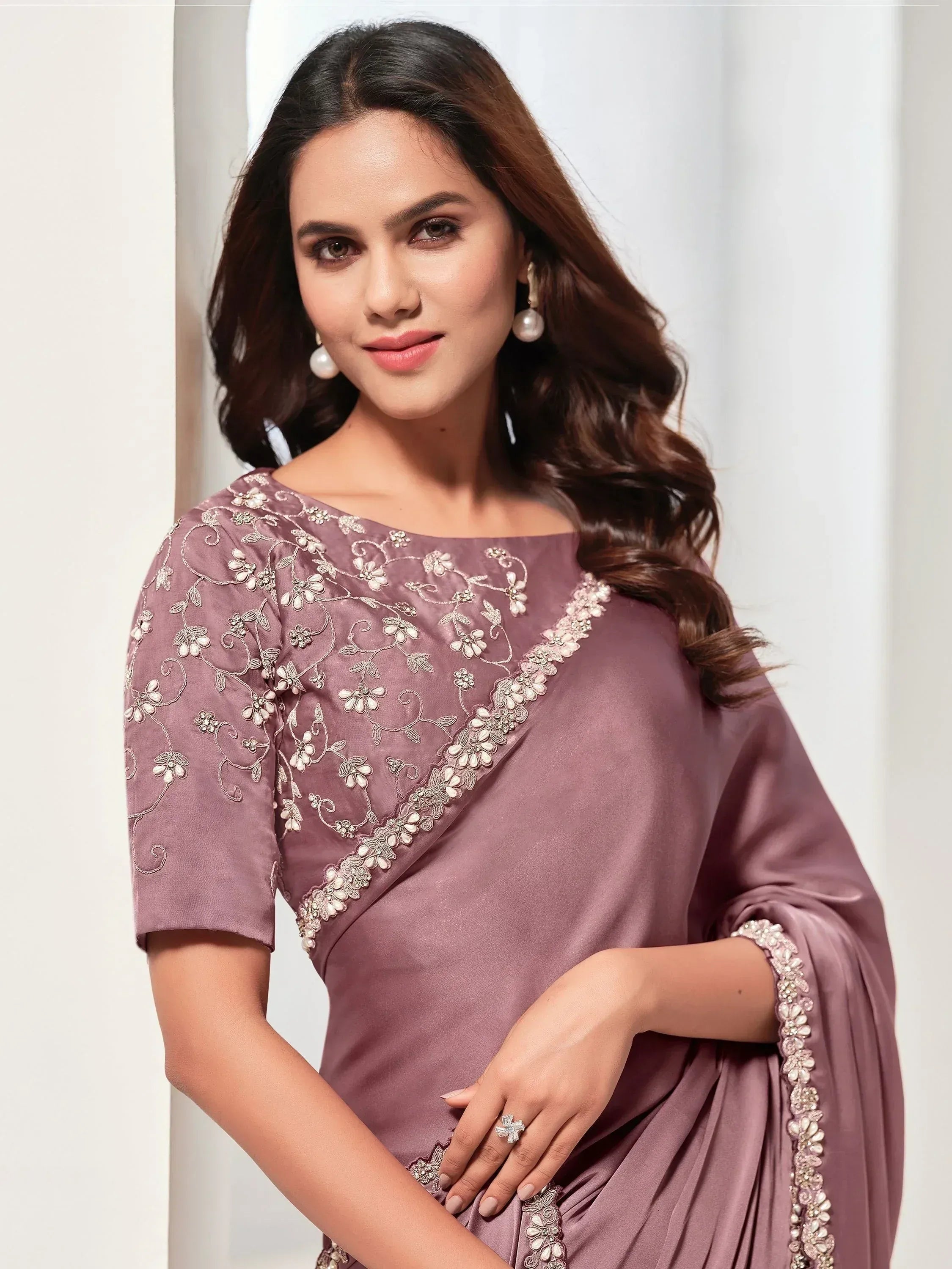 Elegant mauve saree with floral embroidery, perfect for Indian ethnic occasions