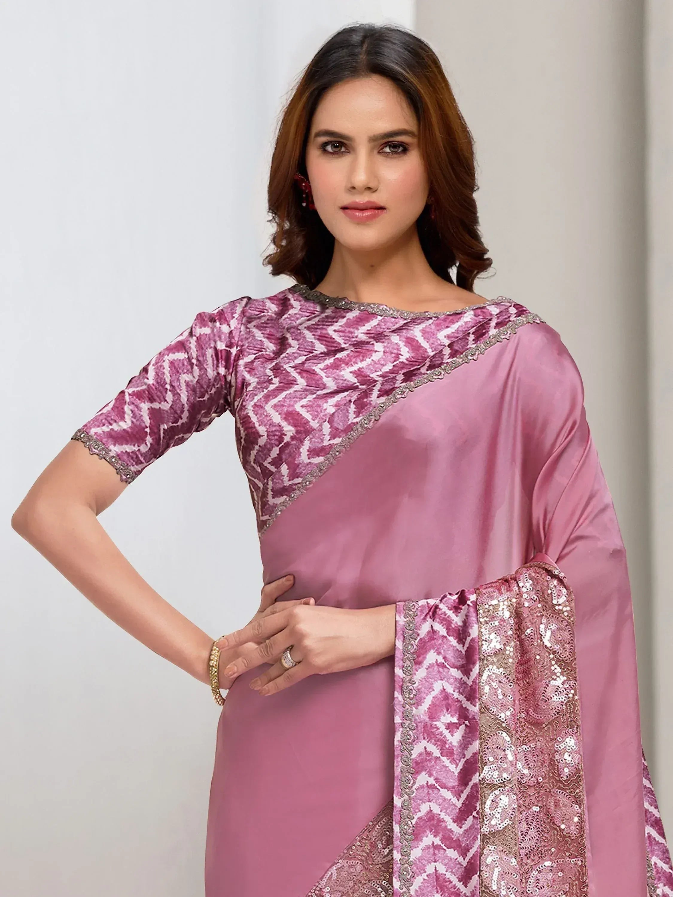 Pink ethnic gown with geometric print and sequin detailing, perfect for Indian festive wear