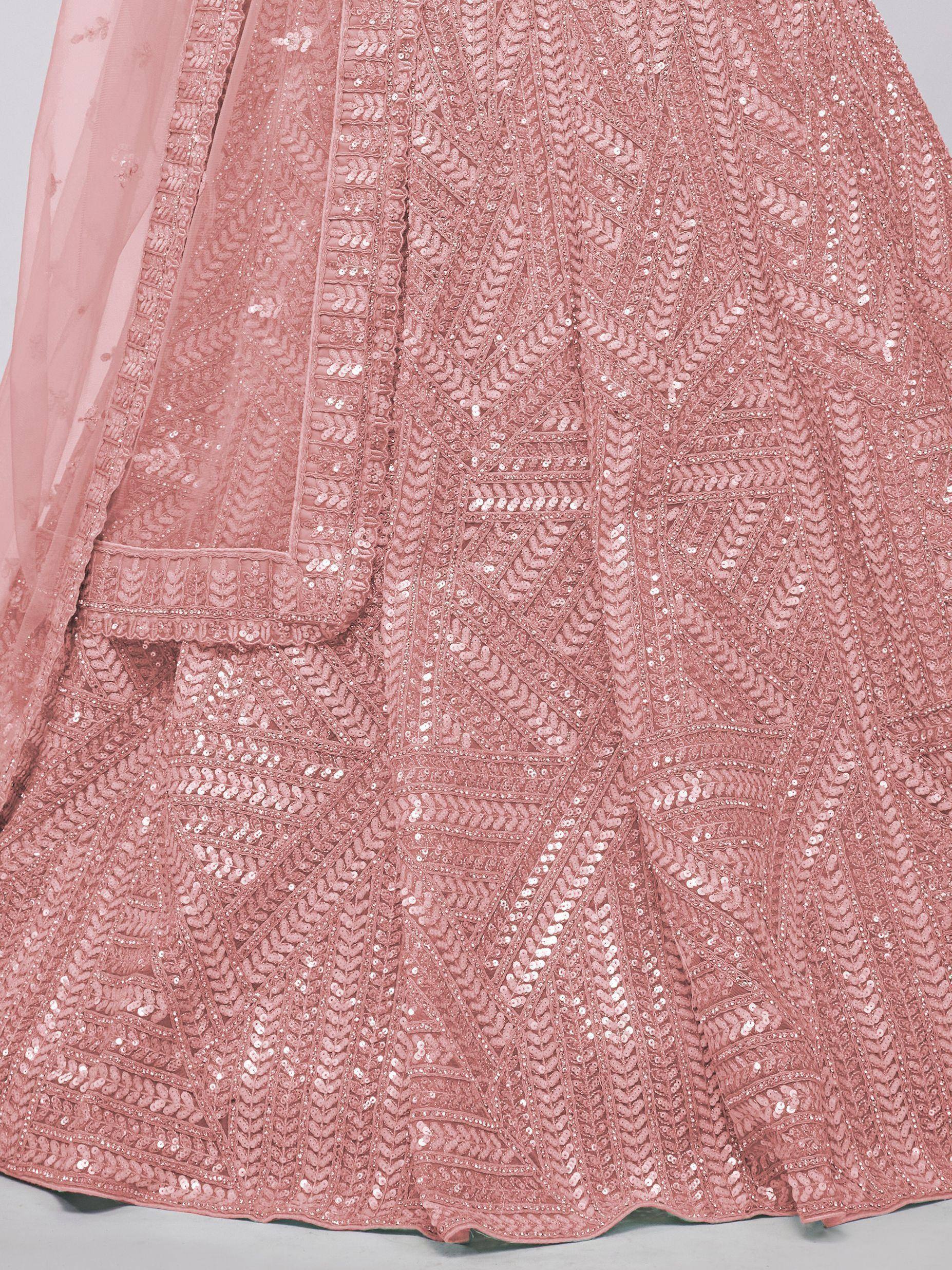 Pink sequin-embellished lehenga choli with intricate geometric embroidery, perfect for Indian ethnic wear.
