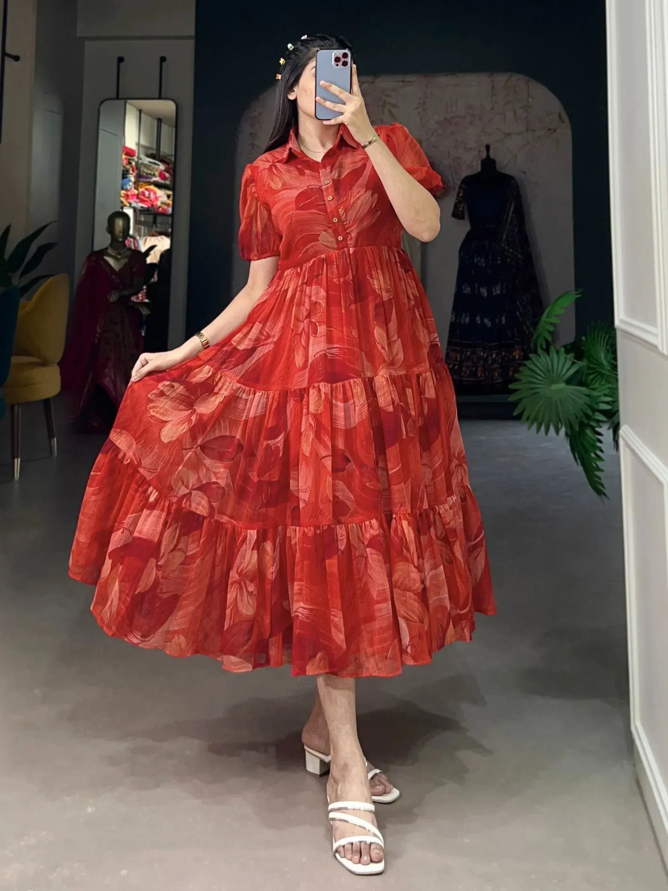 Red floral tiered ethnic gown with puff sleeves, perfect for Indian occasions and festive wear.