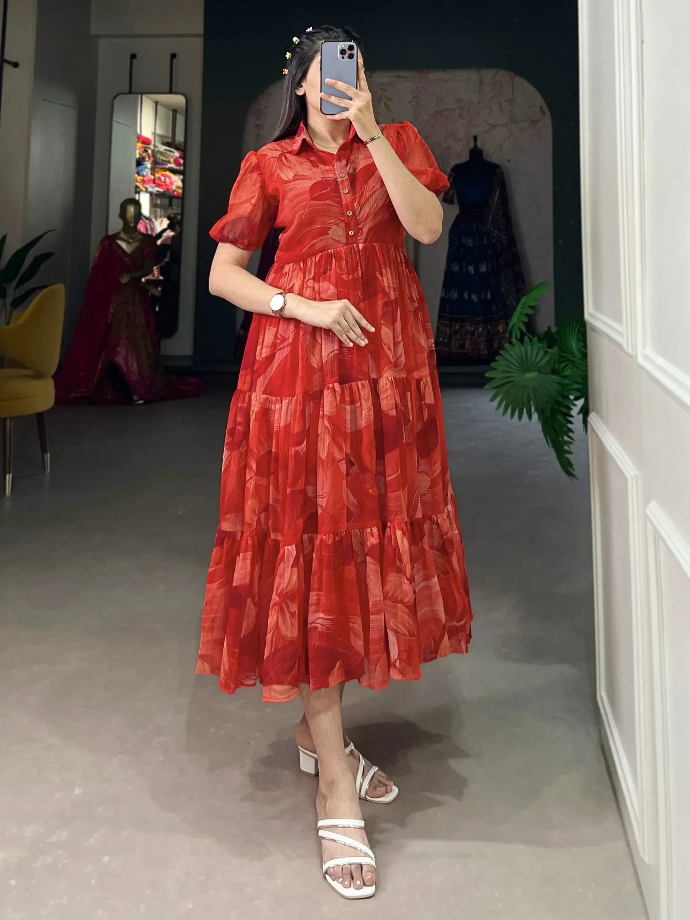 Red floral tiered ethnic gown with puff sleeves, perfect for Indian occasions and festive wear.