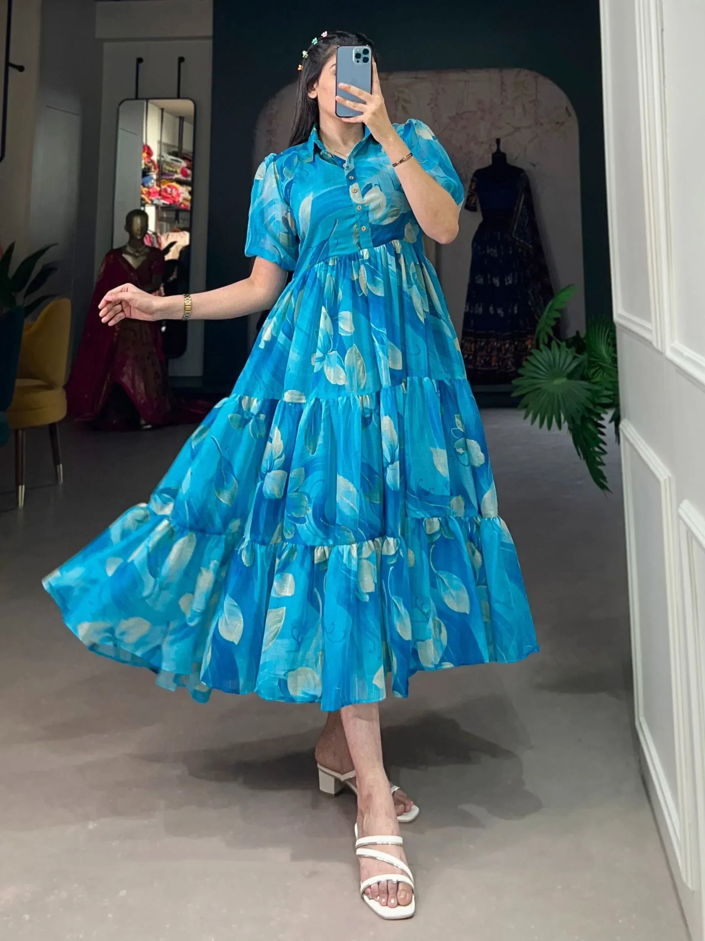 Blue floral tiered ethnic gown with puff sleeves, perfect for festive occasions and Indian wear