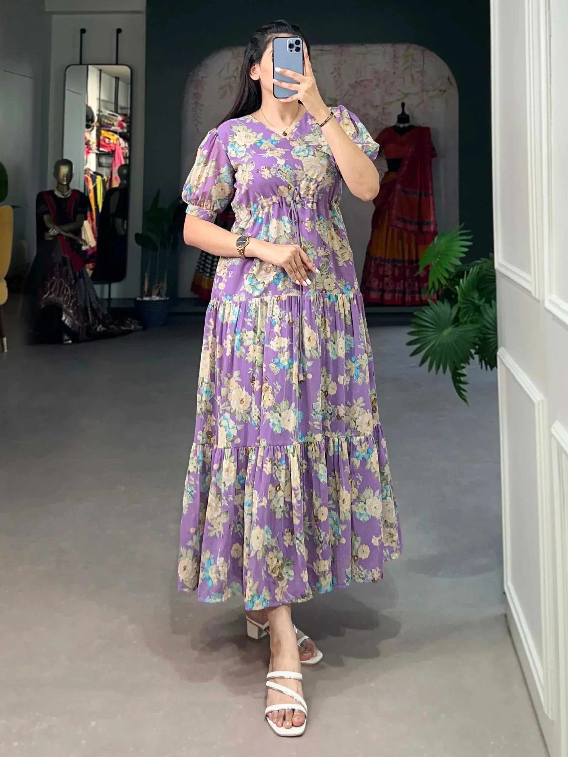 Purple floral ethnic gown with puff sleeves and tiered skirt, perfect for Indian wear