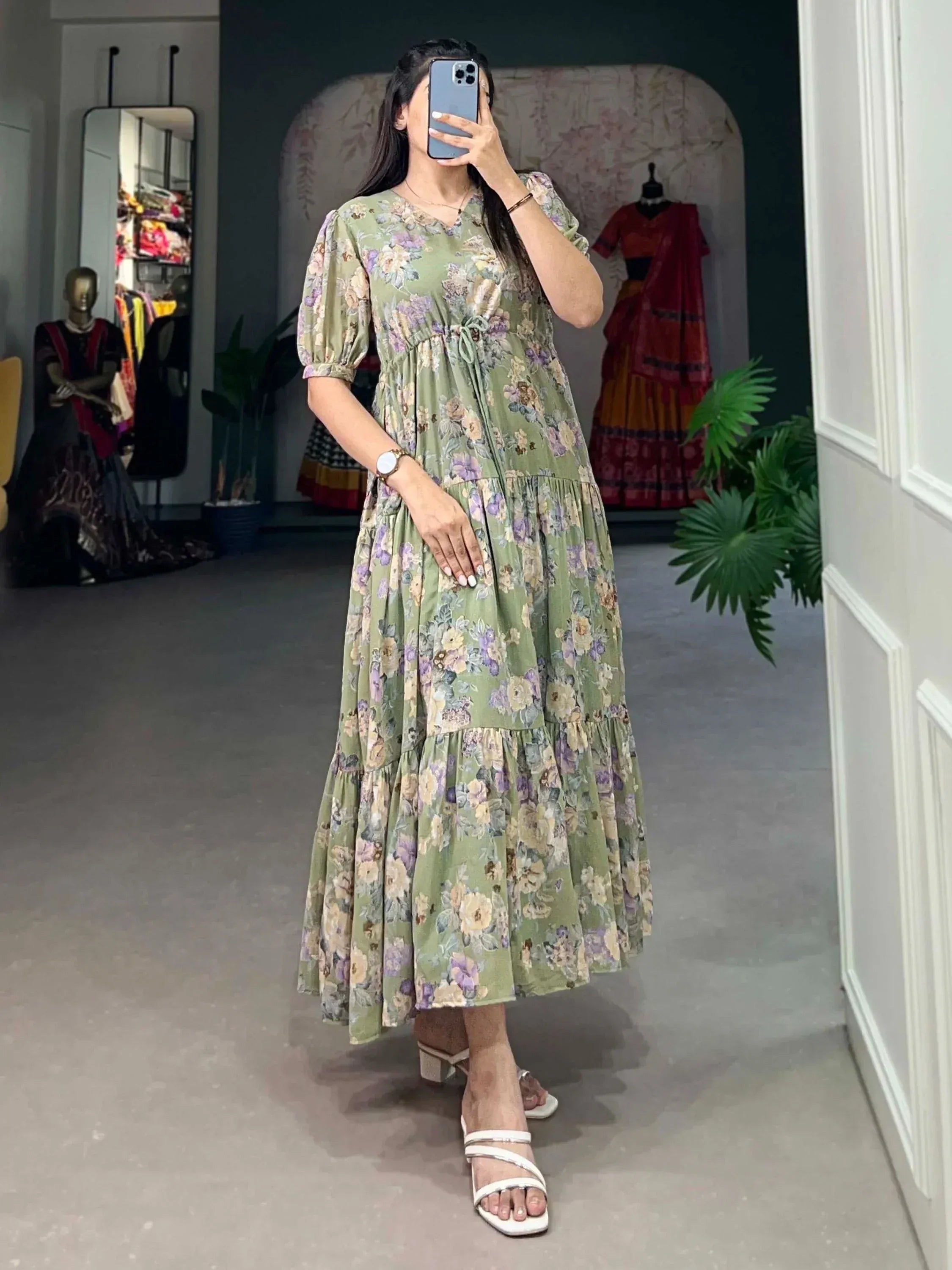 Green floral tiered ethnic gown with puff sleeves, perfect for Indian occasions
