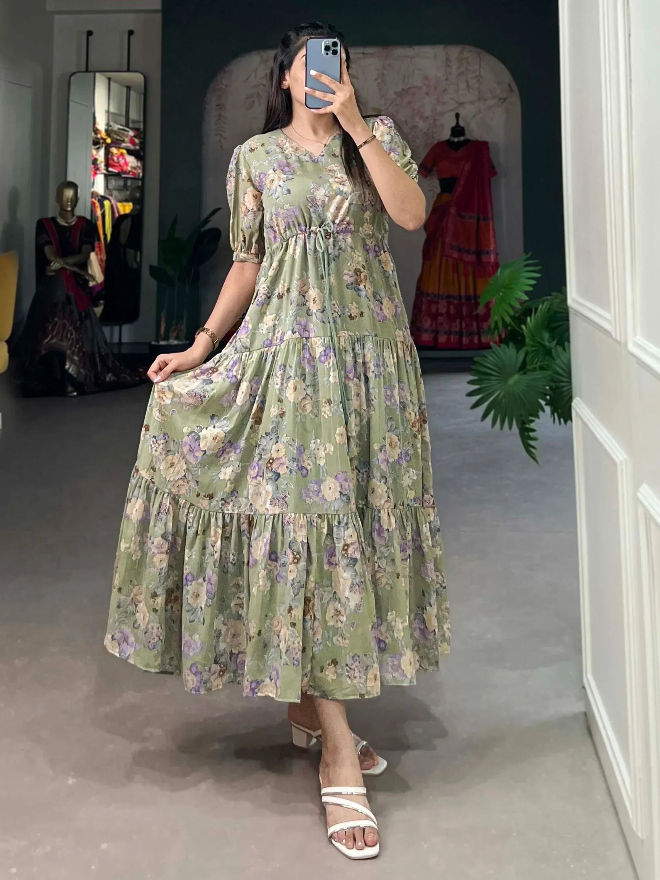 Green floral tiered ethnic gown with puff sleeves, perfect for Indian occasions and casual wear