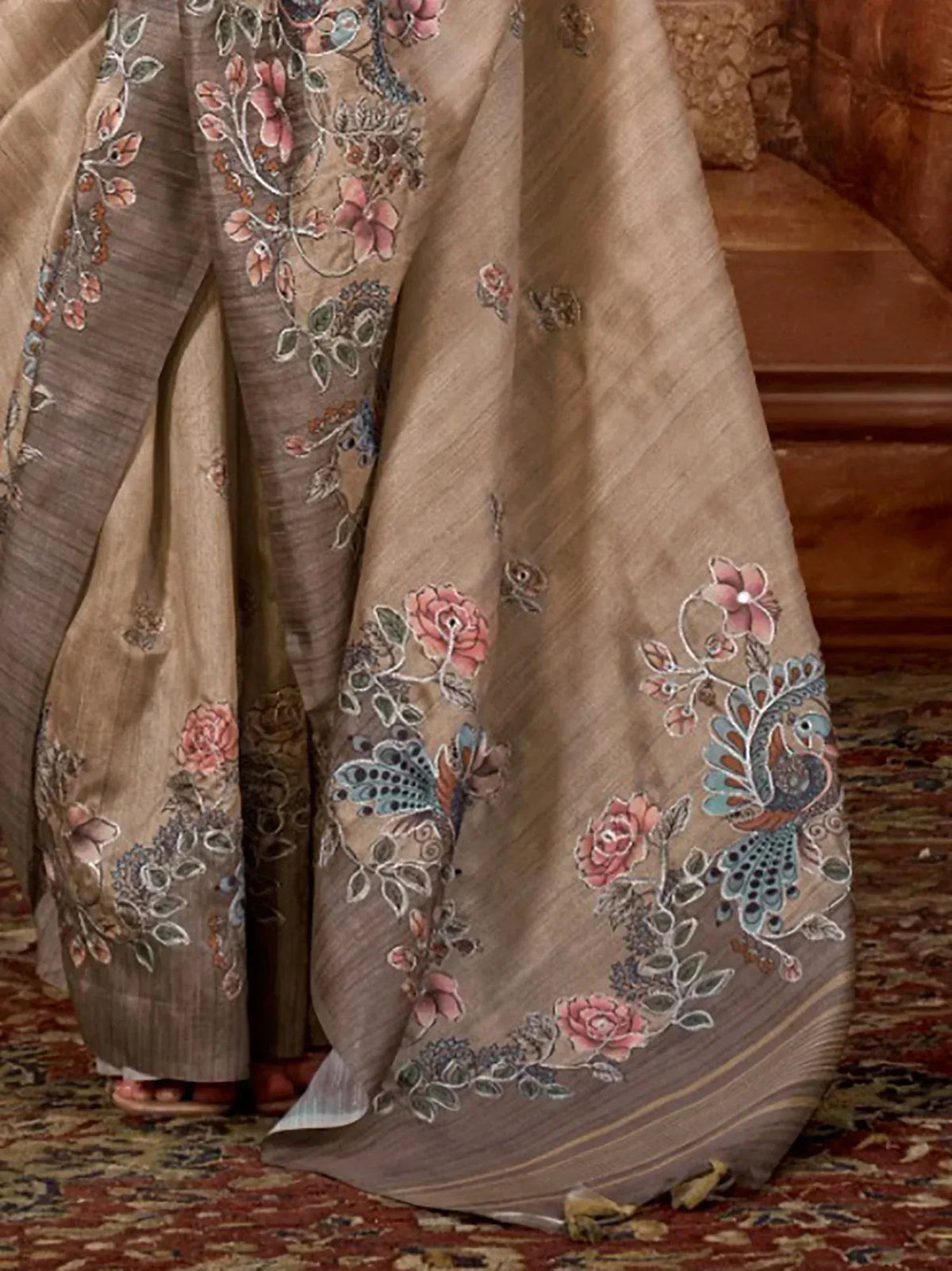 Elegant beige lehenga with floral and peacock embroidery, perfect for Indian ethnic wear occasions