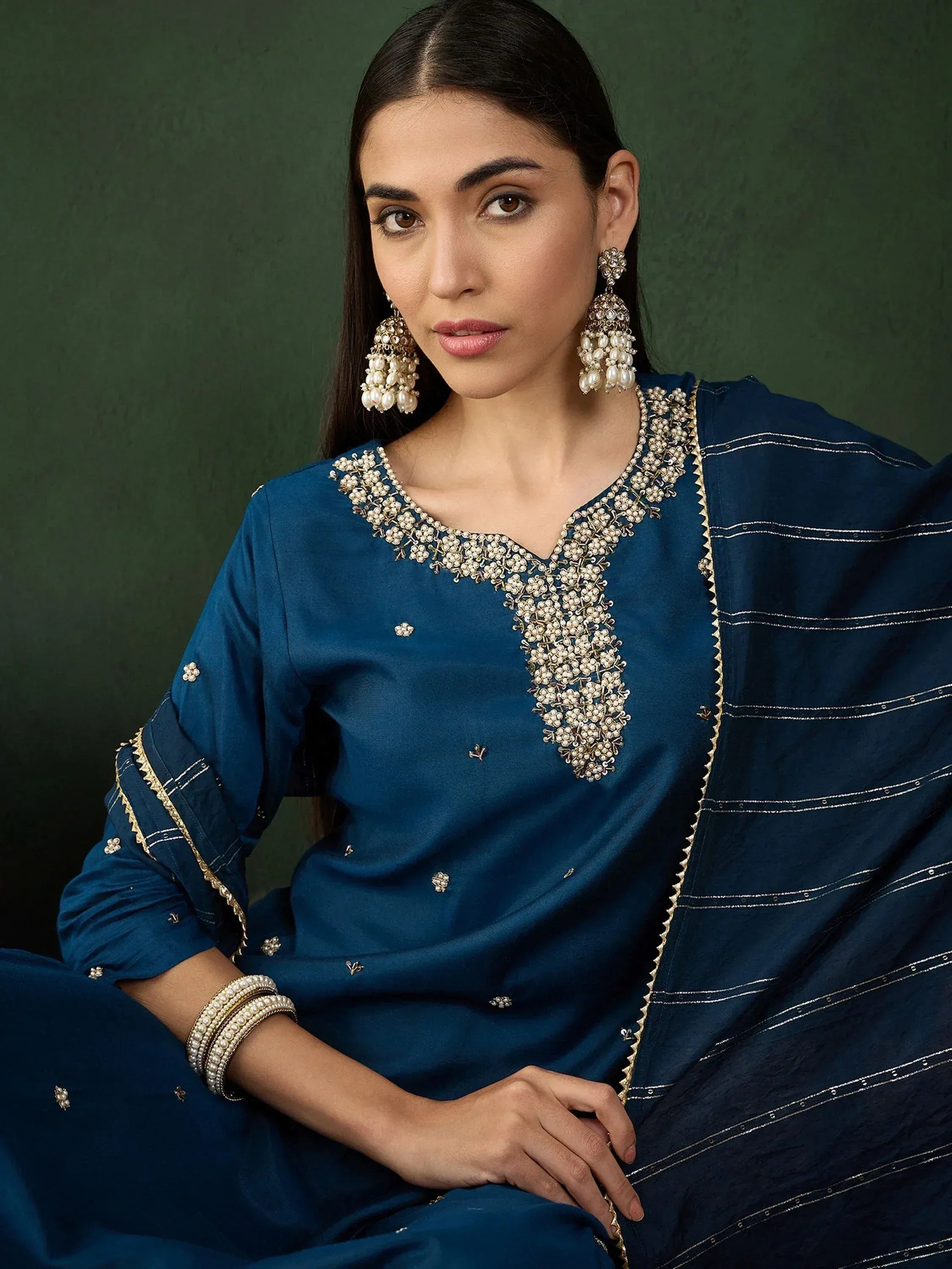 Blue embroidered salwar kameez with pearl jewelry, Indian ethnic wear