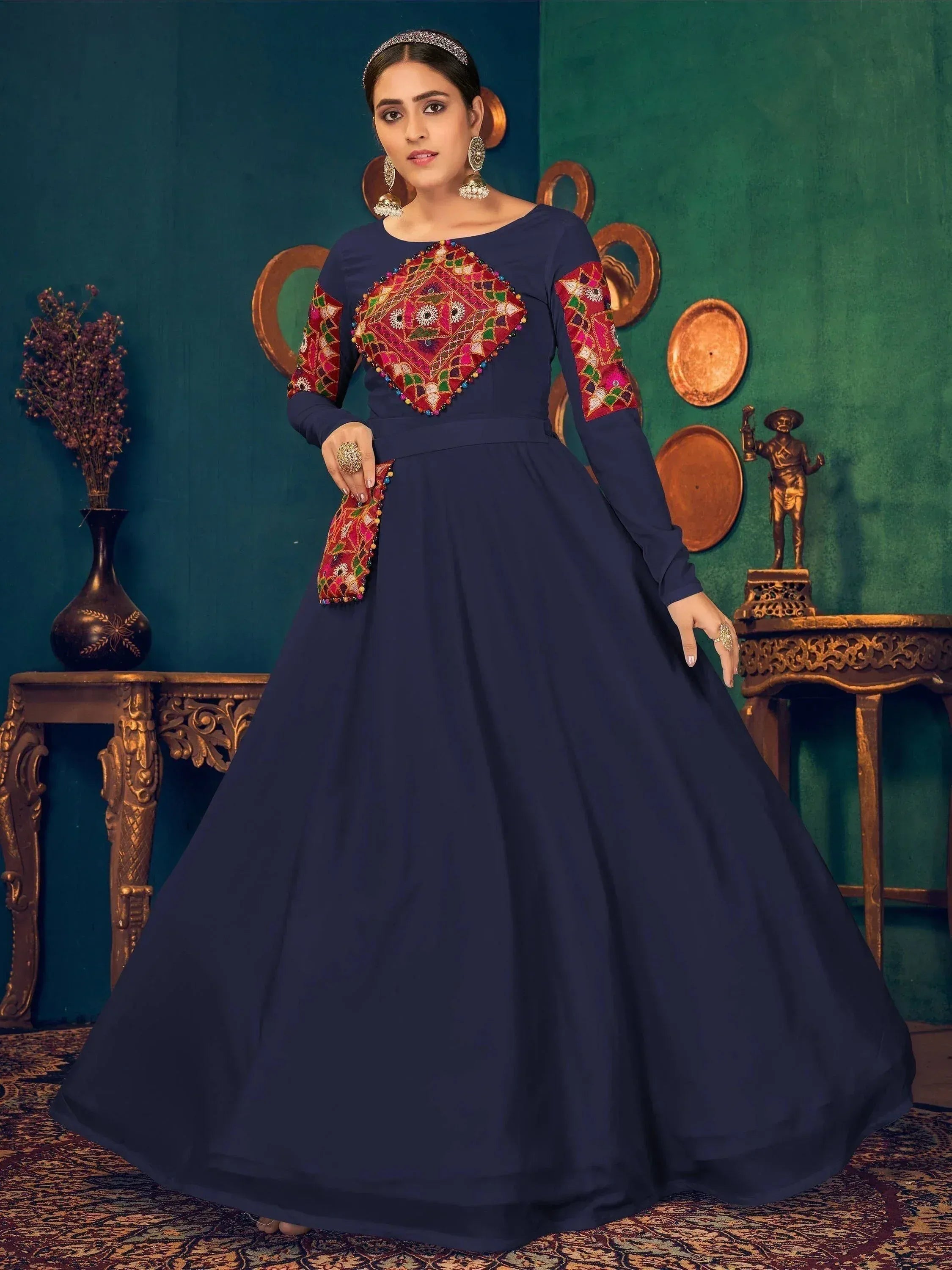 Navy blue ethnic gown with colorful mirror work and long sleeves, perfect for Indian occasions