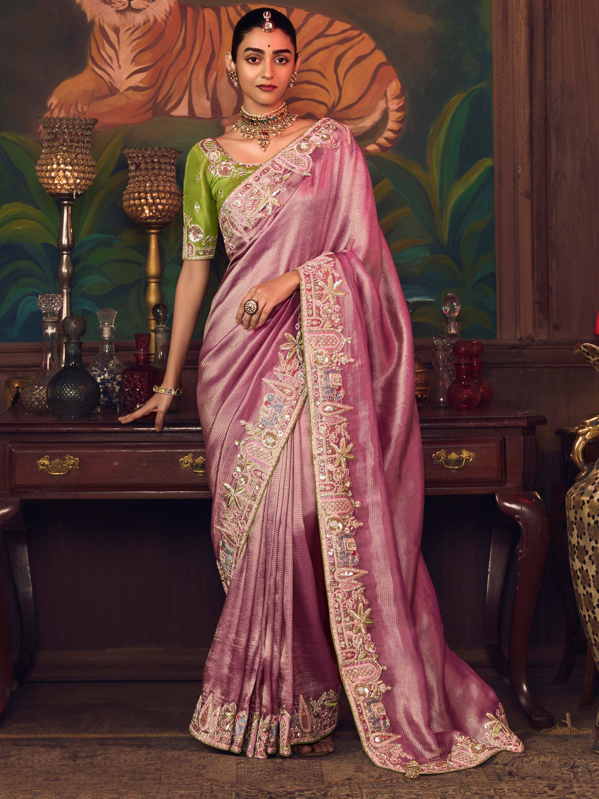 Elegant pink embroidered saree with green blouse, traditional Indian ethnic wear for festive occasions