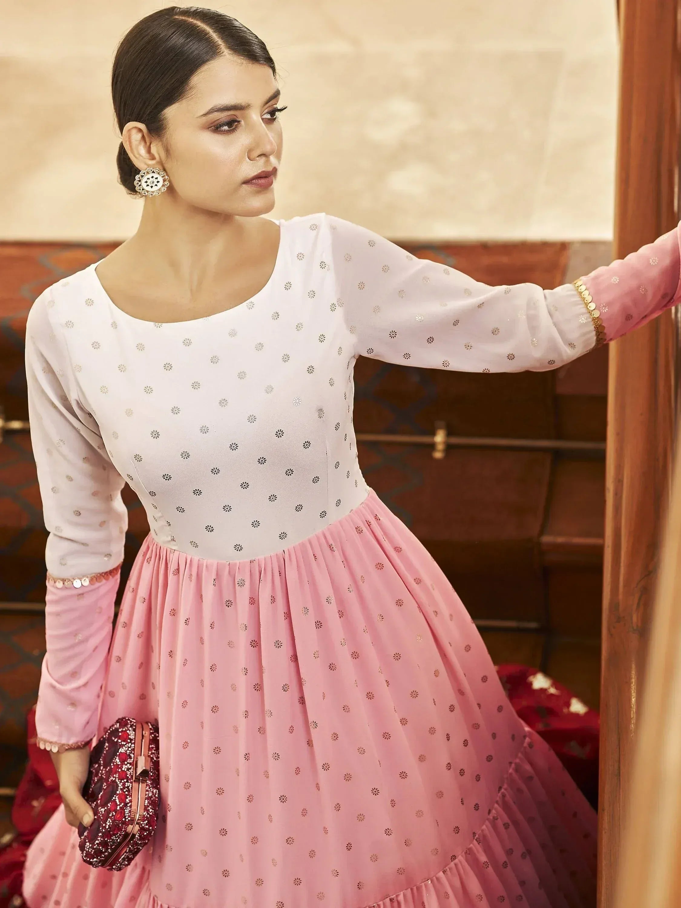 Elegant pink and white ethnic gown with floral embroidery, perfect for Indian festive occasions