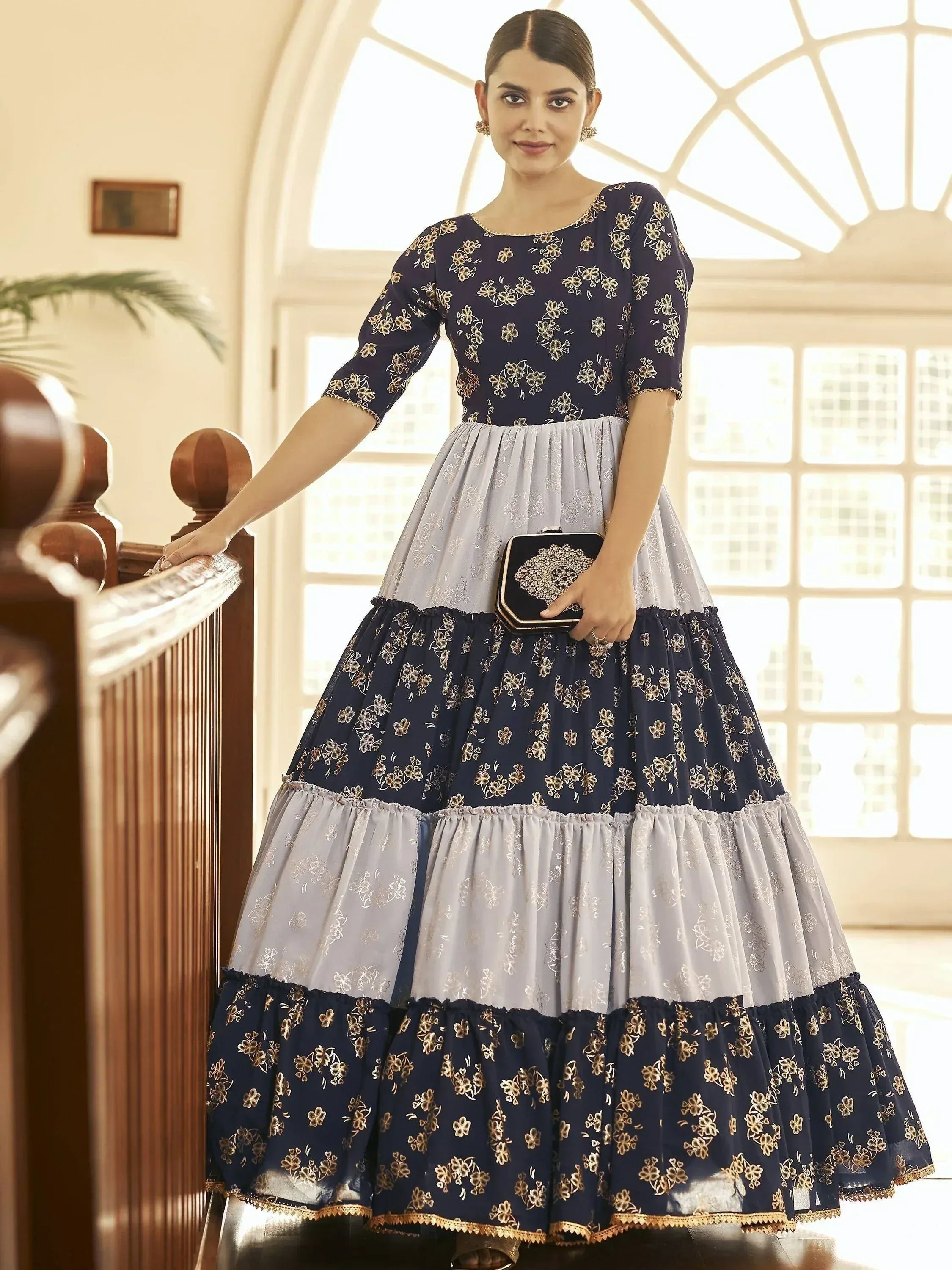 Navy and grey floral embroidered ethnic gown with tiered skirt, perfect for Indian occasions