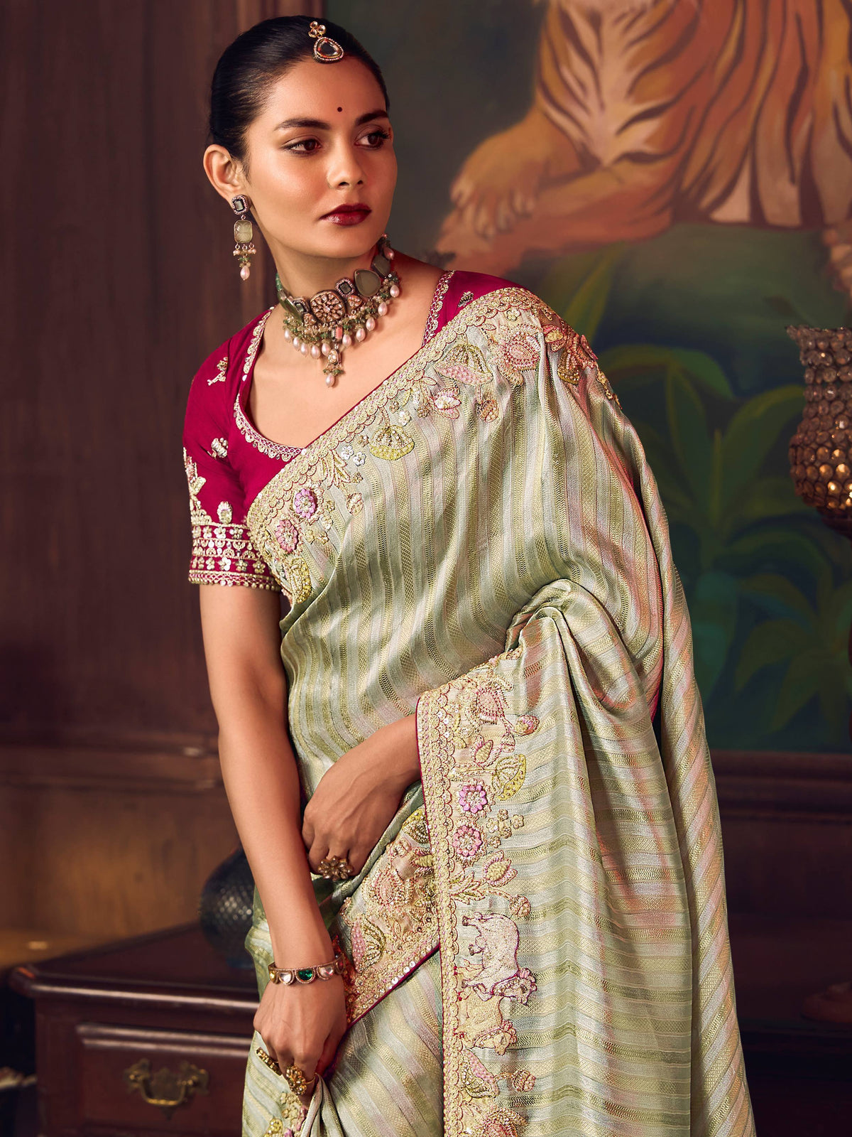 Elegant Indian saree with floral embroidery and matching blouse, perfect for festive occasions.