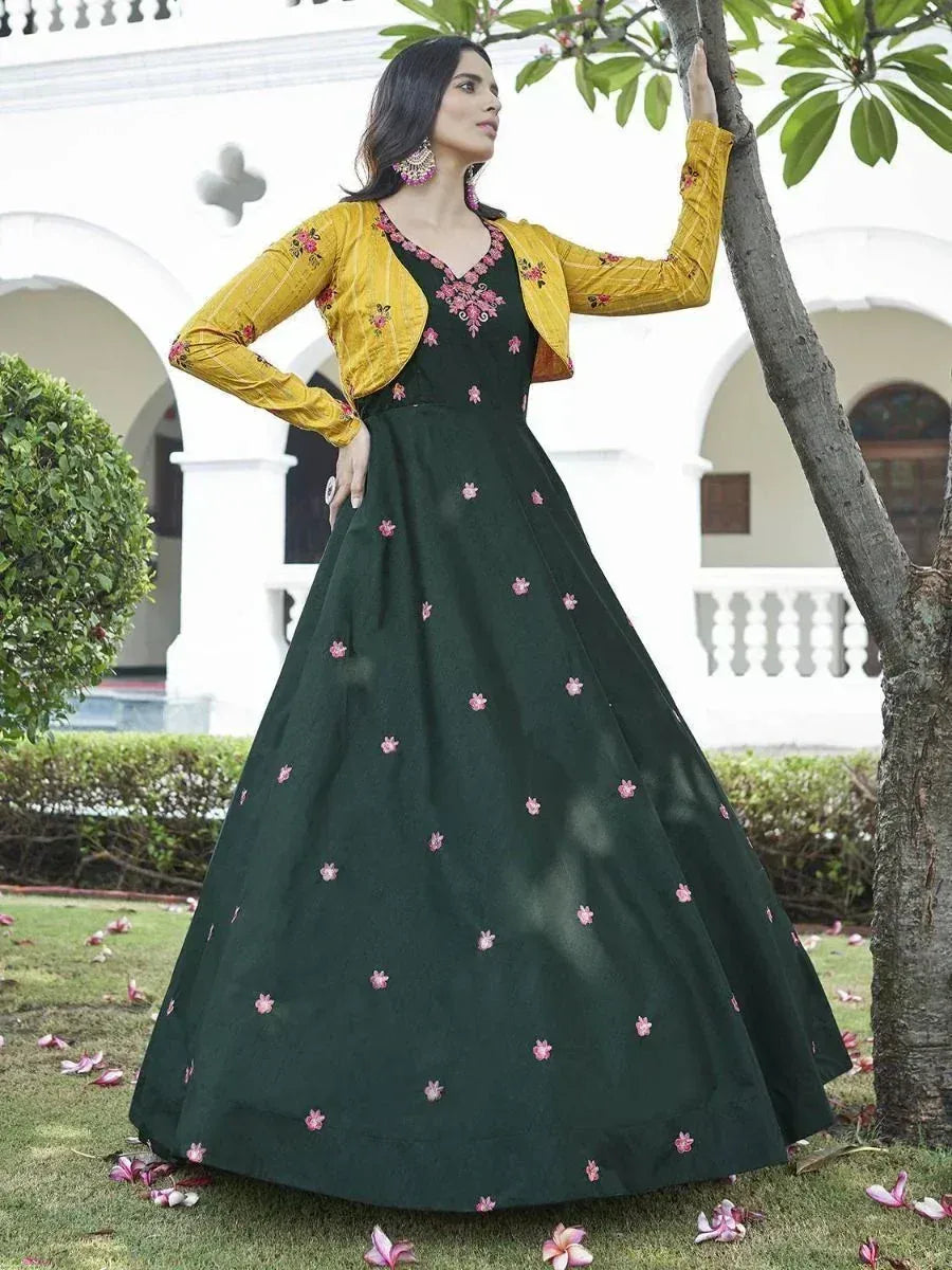 Elegant green embroidered anarkali gown with yellow jacket, perfect for Indian ethnic occasions