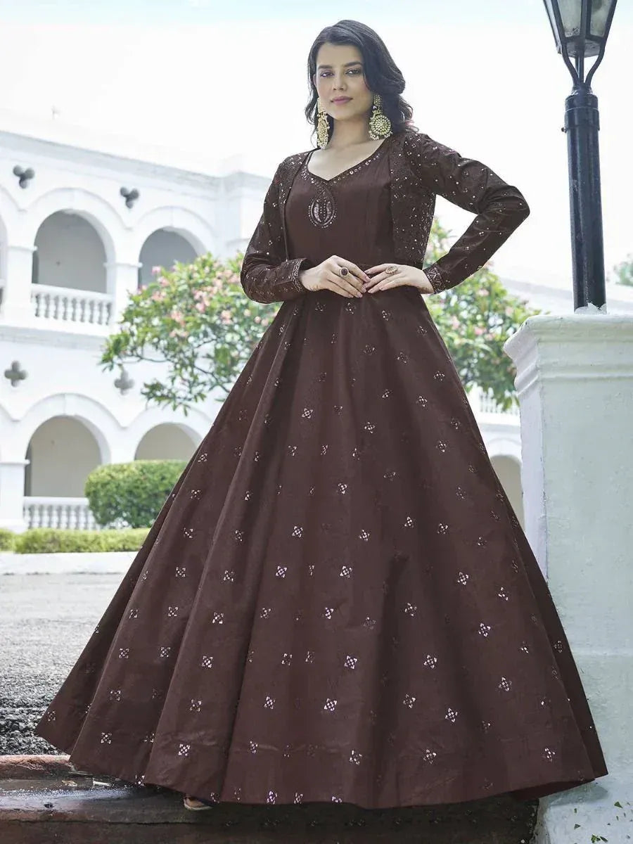 Brown embroidered ethnic gown with long sleeves, perfect for Indian occasions and festive wear.