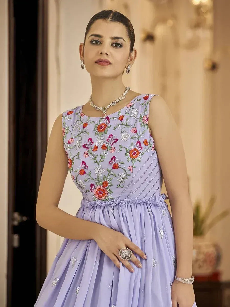 Lavender floral embroidered ethnic gown with sequin detailing, perfect for Indian festive occasions.