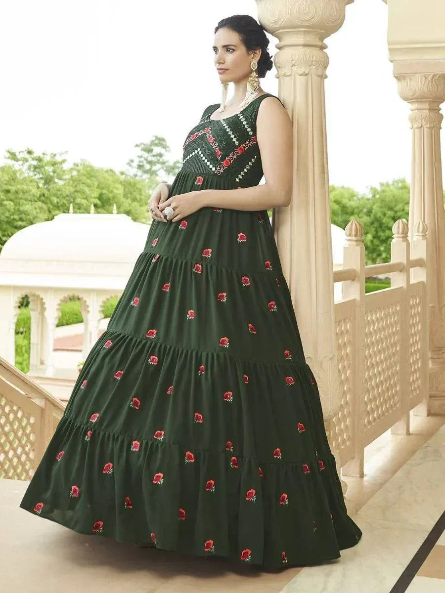 Green embroidered ethnic gown with floral motifs, perfect for Indian occasions and festive wear