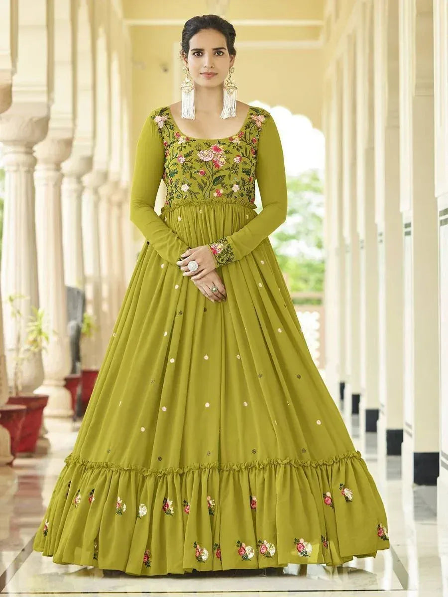 Olive green embroidered anarkali gown with floral detailing, perfect for Indian ethnic occasions