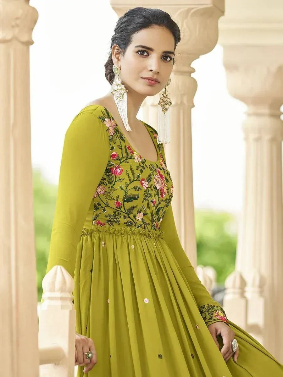 Olive green embroidered ethnic gown with floral design, perfect for Indian occasions and festive wear.