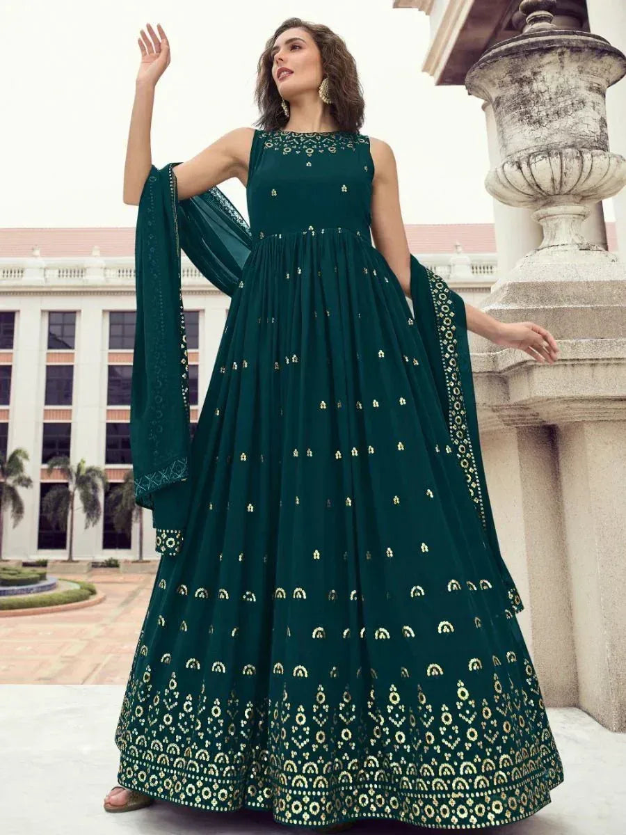 Emerald green designer anarkali gown with gold embroidery, perfect for Indian ethnic occasions