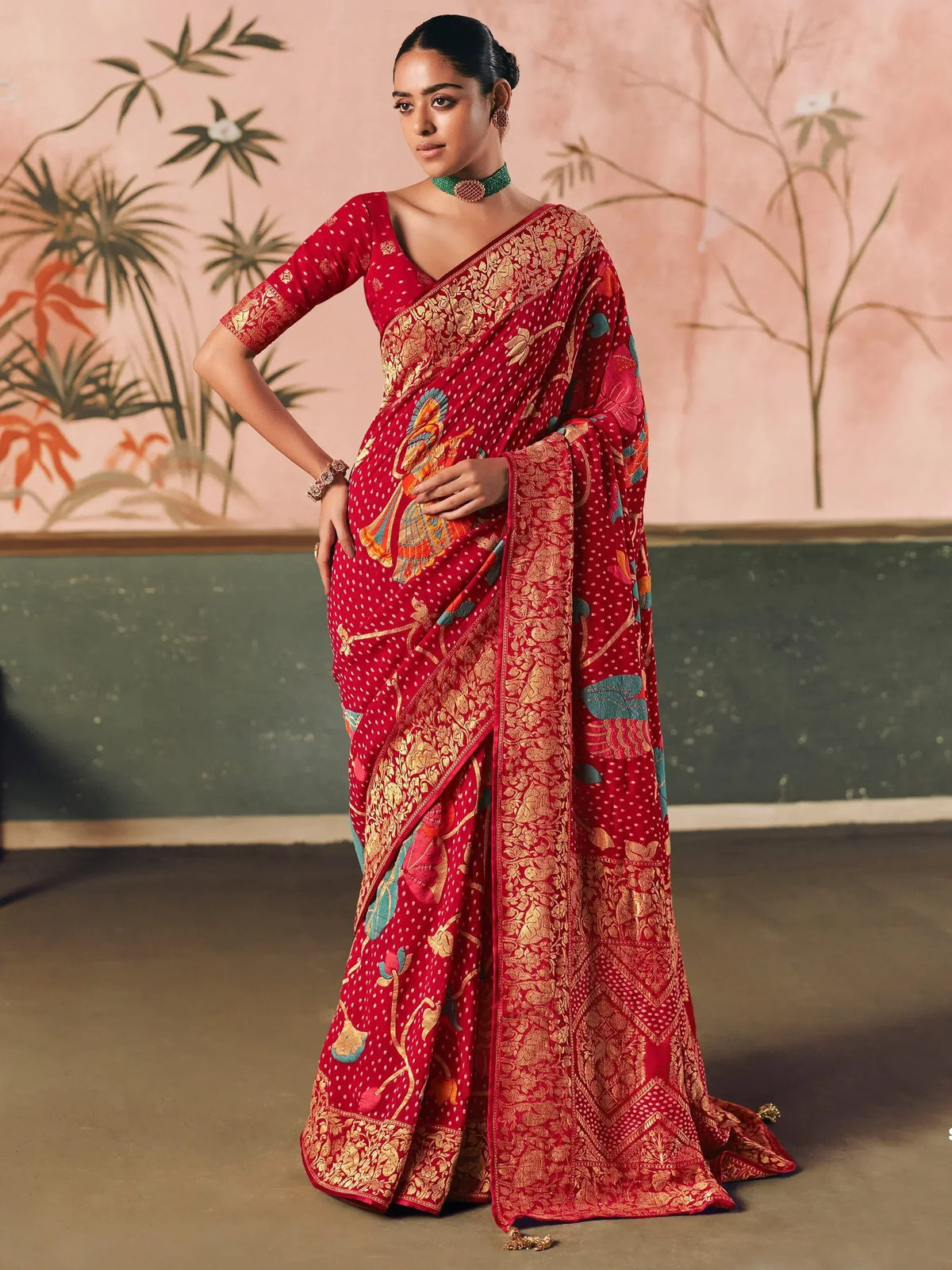 Red designer saree with gold zari and floral motifs, perfect for Indian ethnic wear occasions