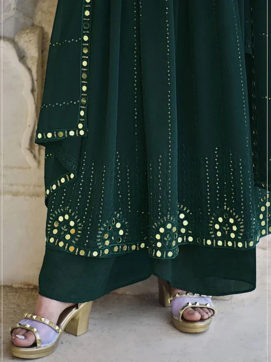 Dark green ethnic palazzo suit with mirror work and gold block heels