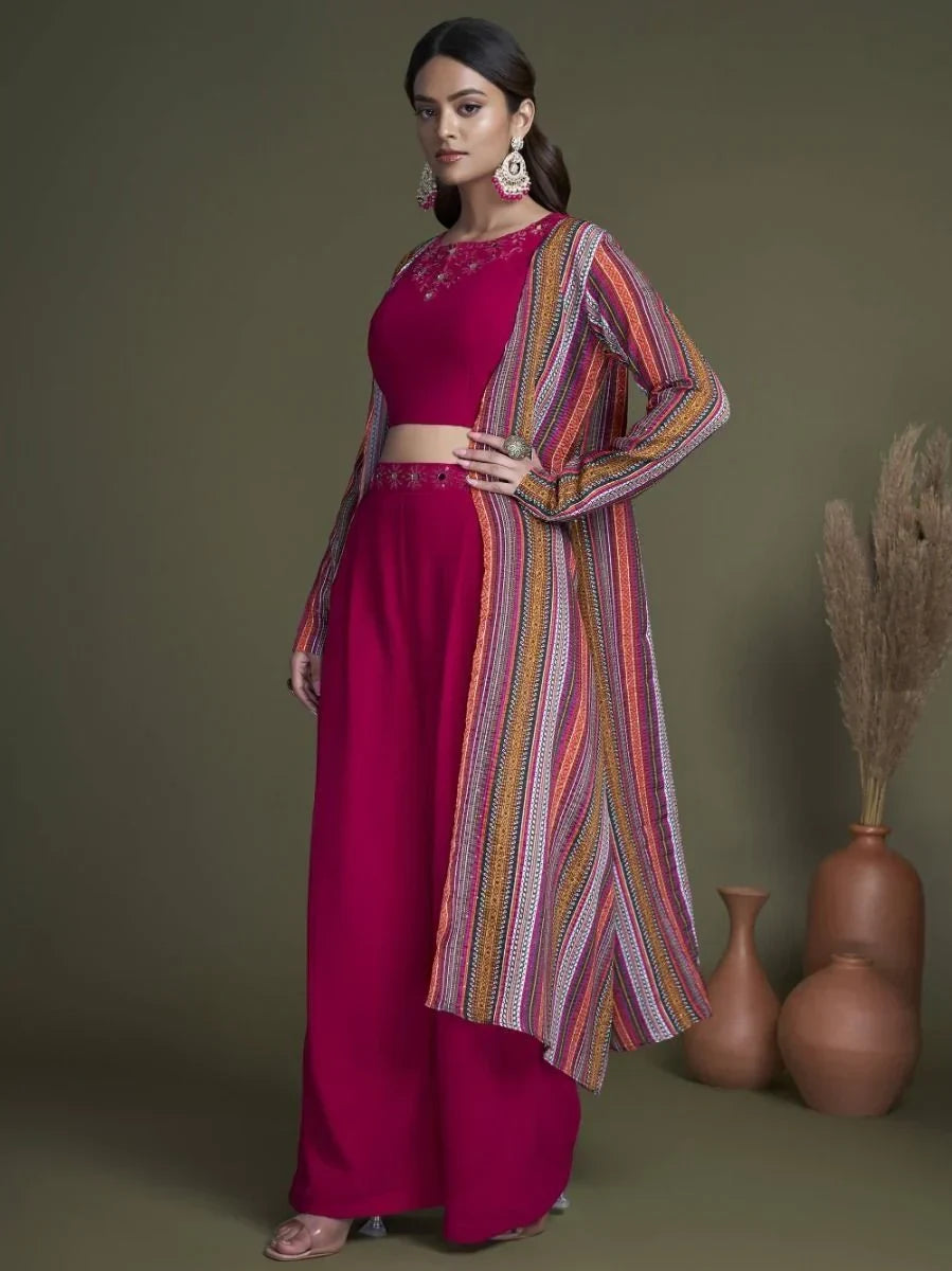 Woman wearing magenta ethnic palazzo set with multicolor long jacket and embroidery