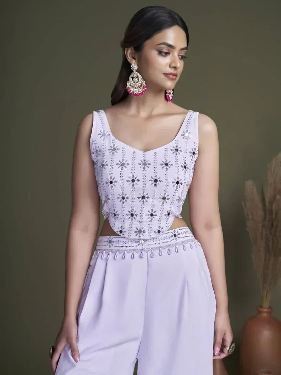Lavender ethnic crop top with floral embroidery and matching palazzo pants, styled with statement earrings