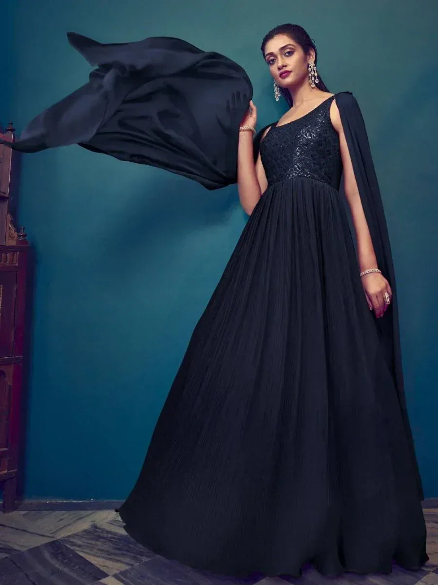 Woman wearing elegant black ethnic gown with dupatta, Indian evening wear fashion