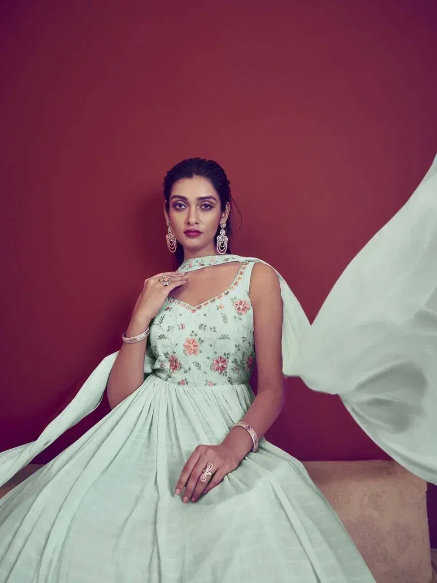 Mint green floral embroidered ethnic gown with cape, perfect for Indian weddings and festive occasions