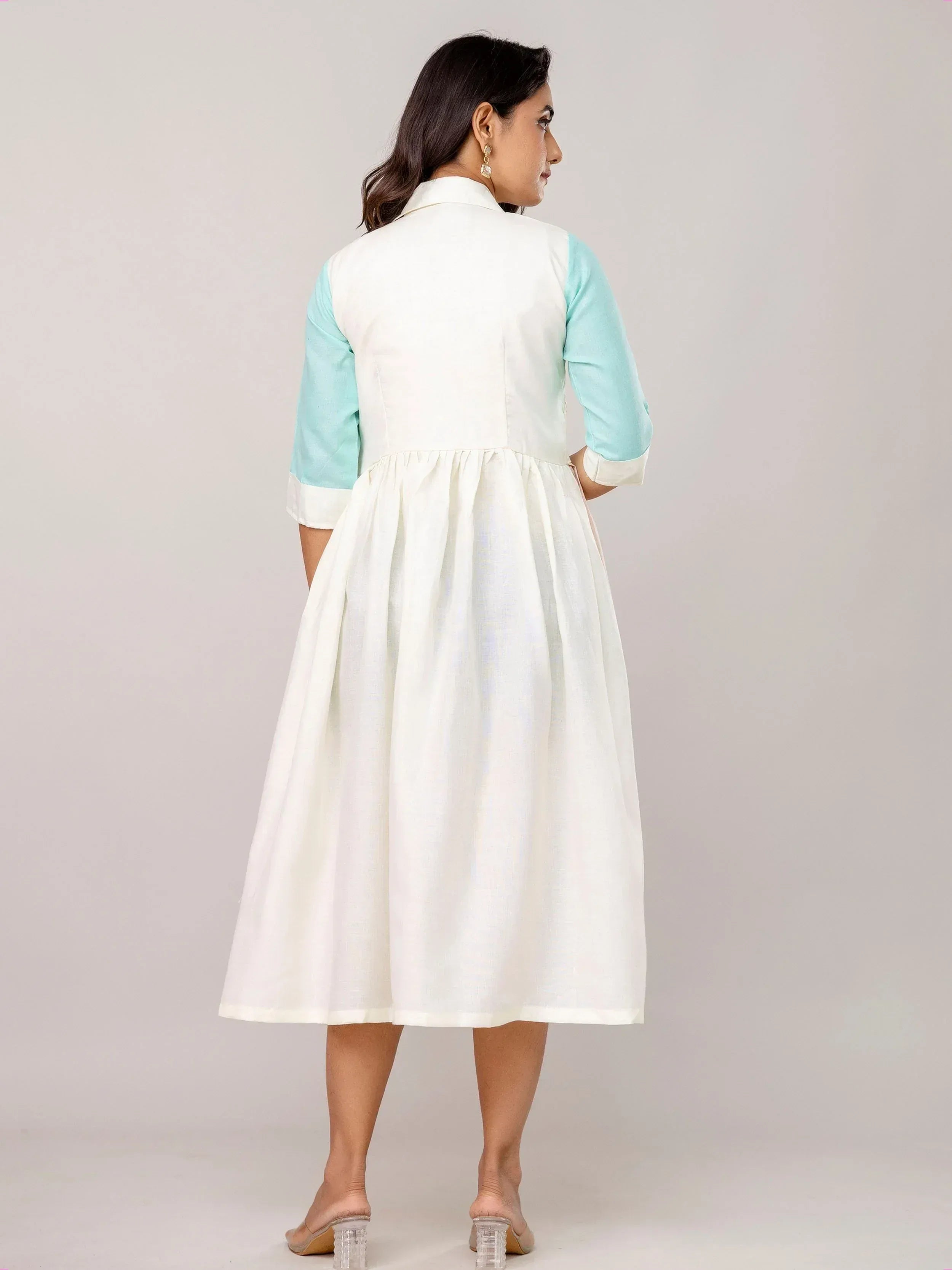 White and mint green ethnic gown with flared skirt, perfect for Indian occasions and festive wear.