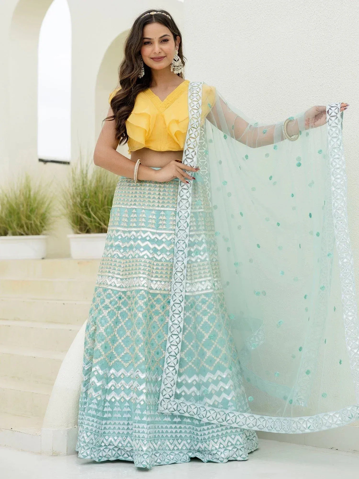 Yellow ruffle crop top with mint green embroidered lehenga and sheer dupatta, Indian ethnic wear