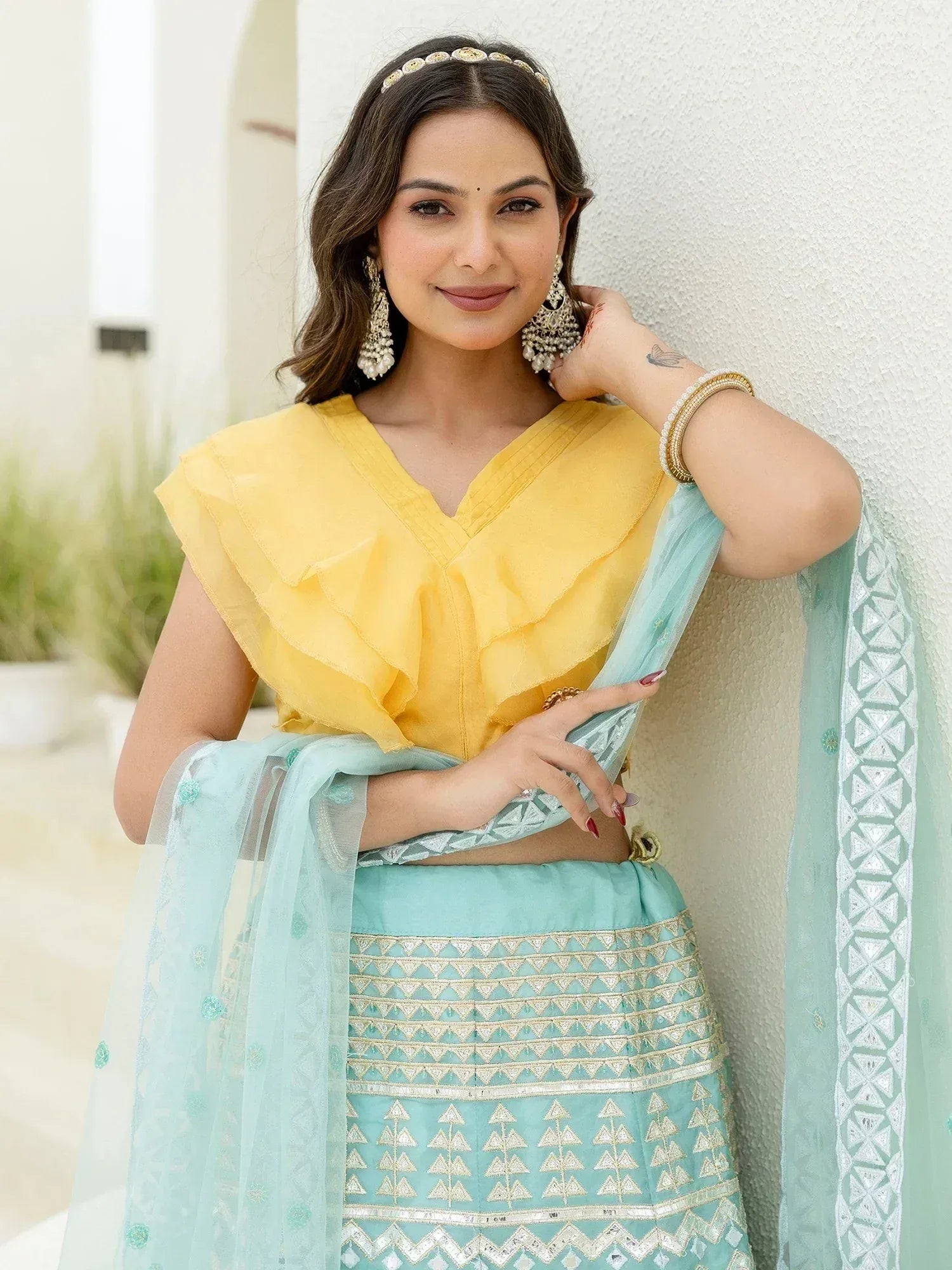 Yellow ruffle top with mint green embroidered lehenga and dupatta, Indian ethnic wear