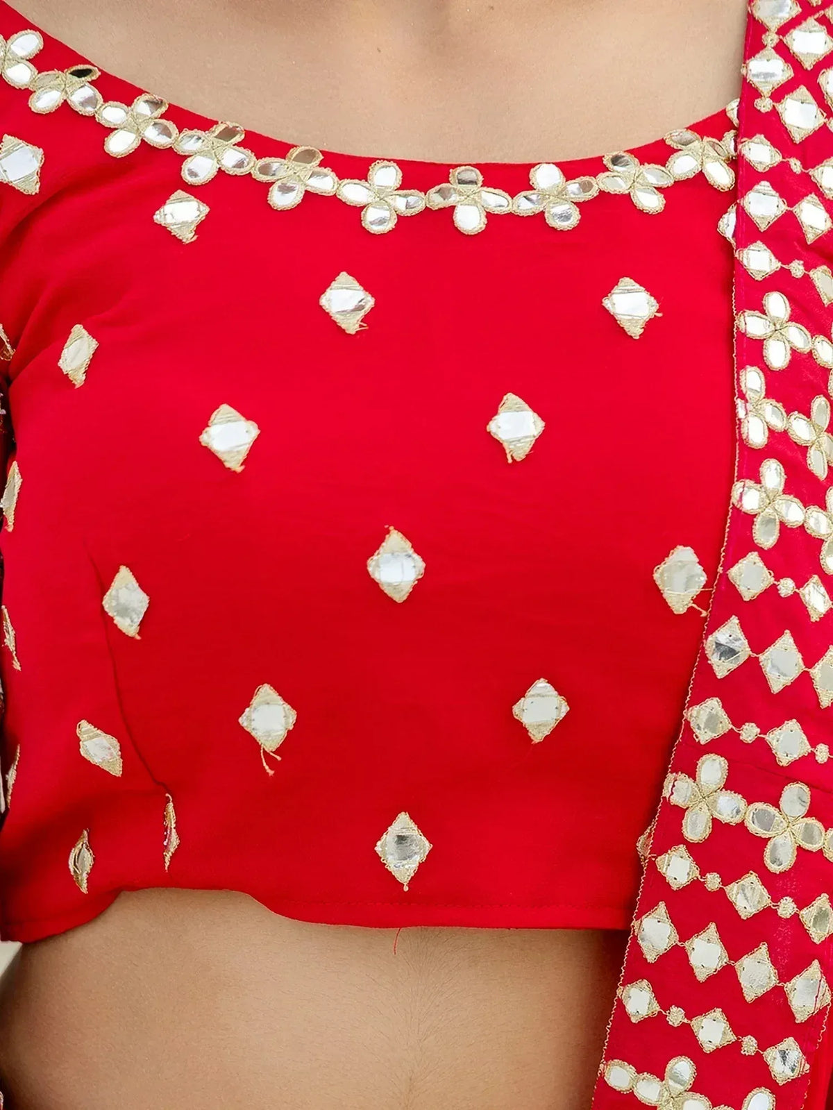 Red ethnic blouse with mirror and gold embroidery, perfect for lehenga choli or saree