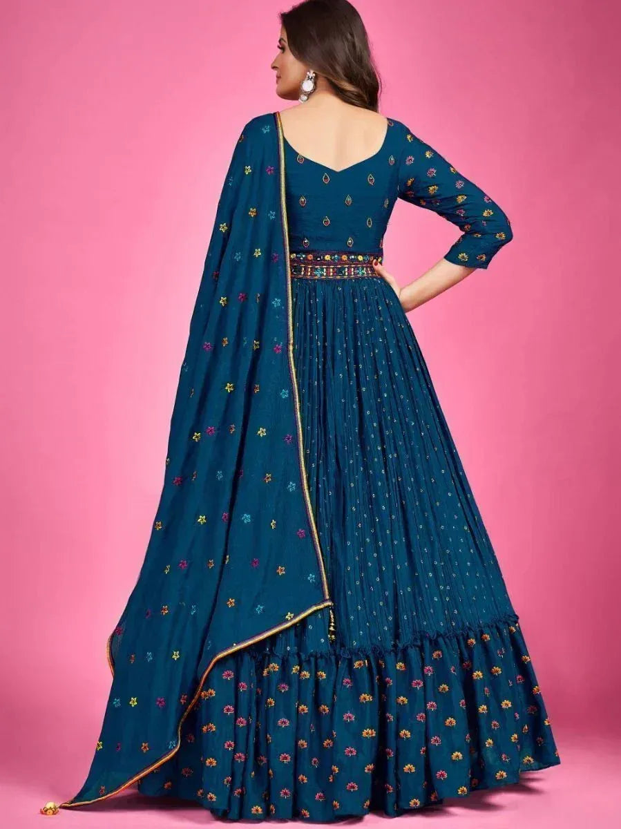 Teal embroidered anarkali gown with floral motifs and gold trim, perfect for Indian ethnic occasions