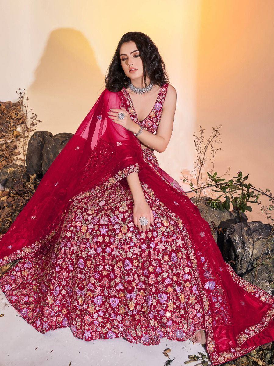 Red floral embroidered lehenga choli with sheer dupatta, perfect for Indian weddings and festive occasions