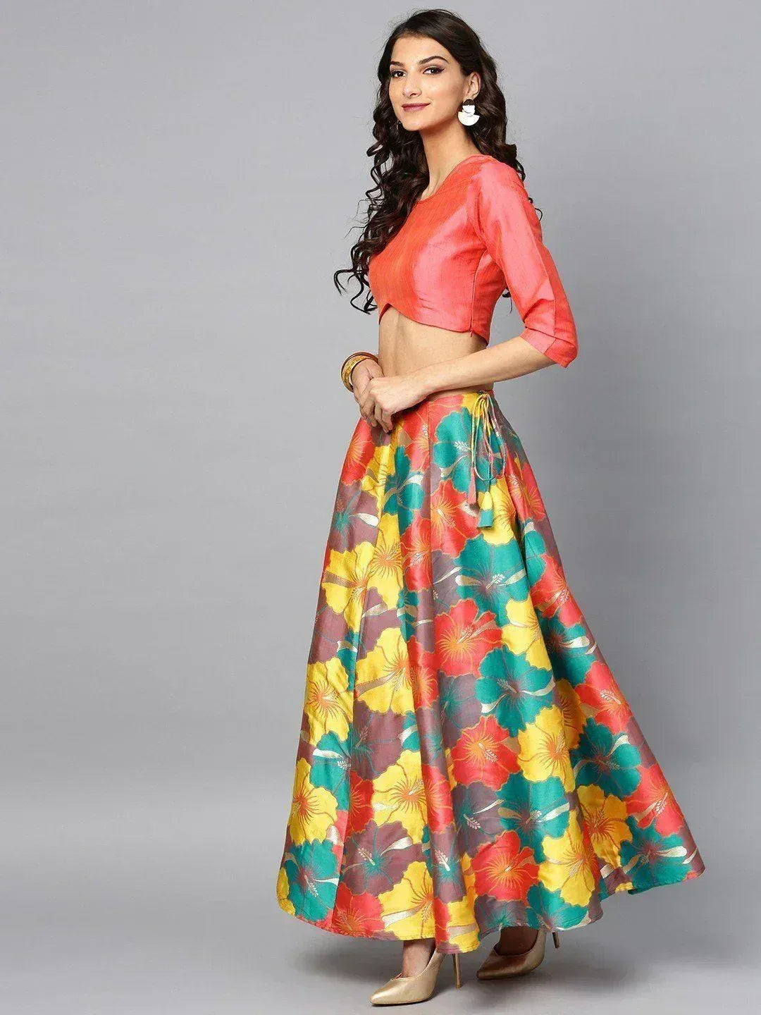 Vibrant floral lehenga choli with coral blouse and colorful skirt for Indian ethnic wear