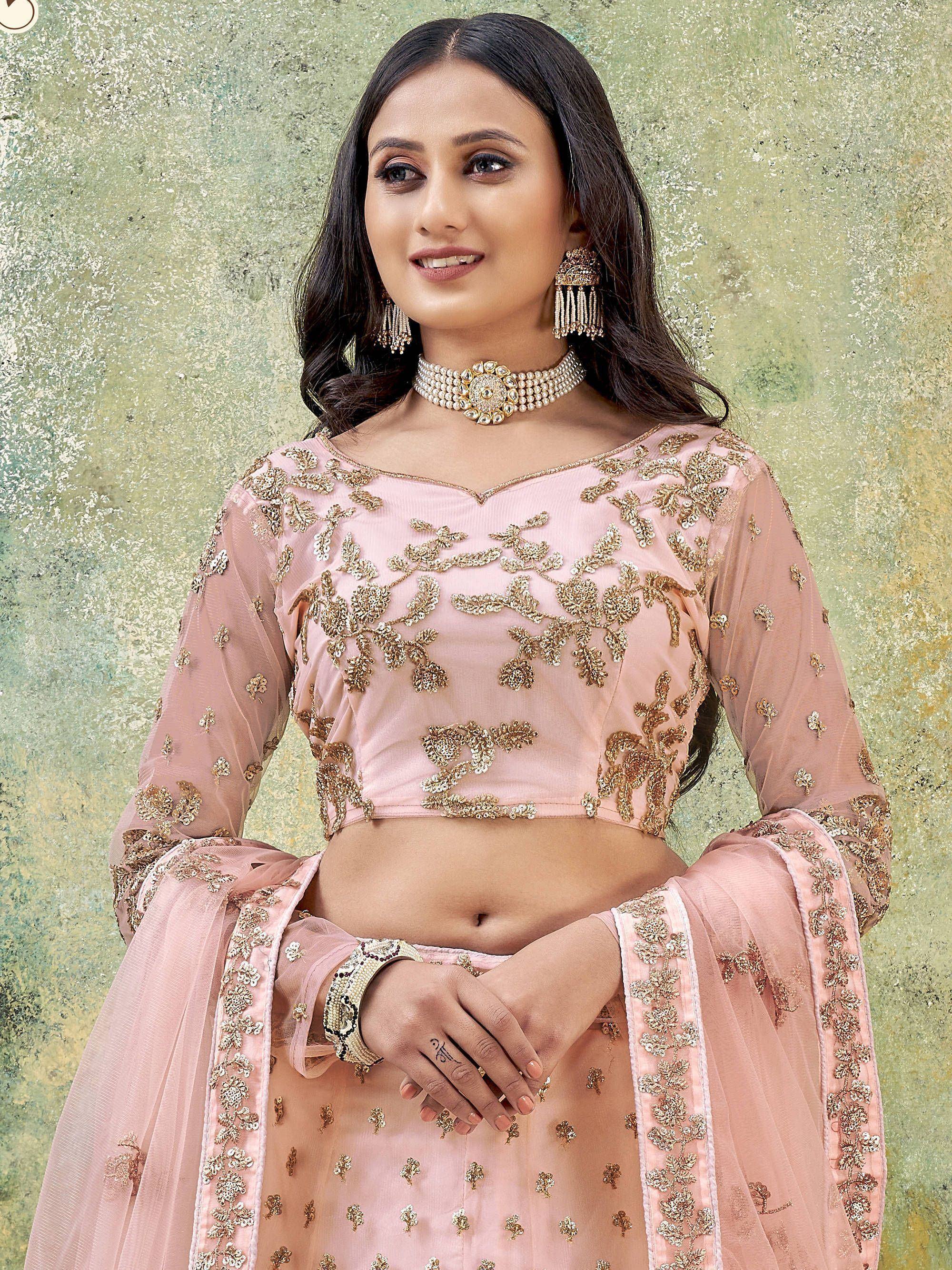 Pink embroidered Indian ethnic wear with gold floral detailing, perfect for festive occasions