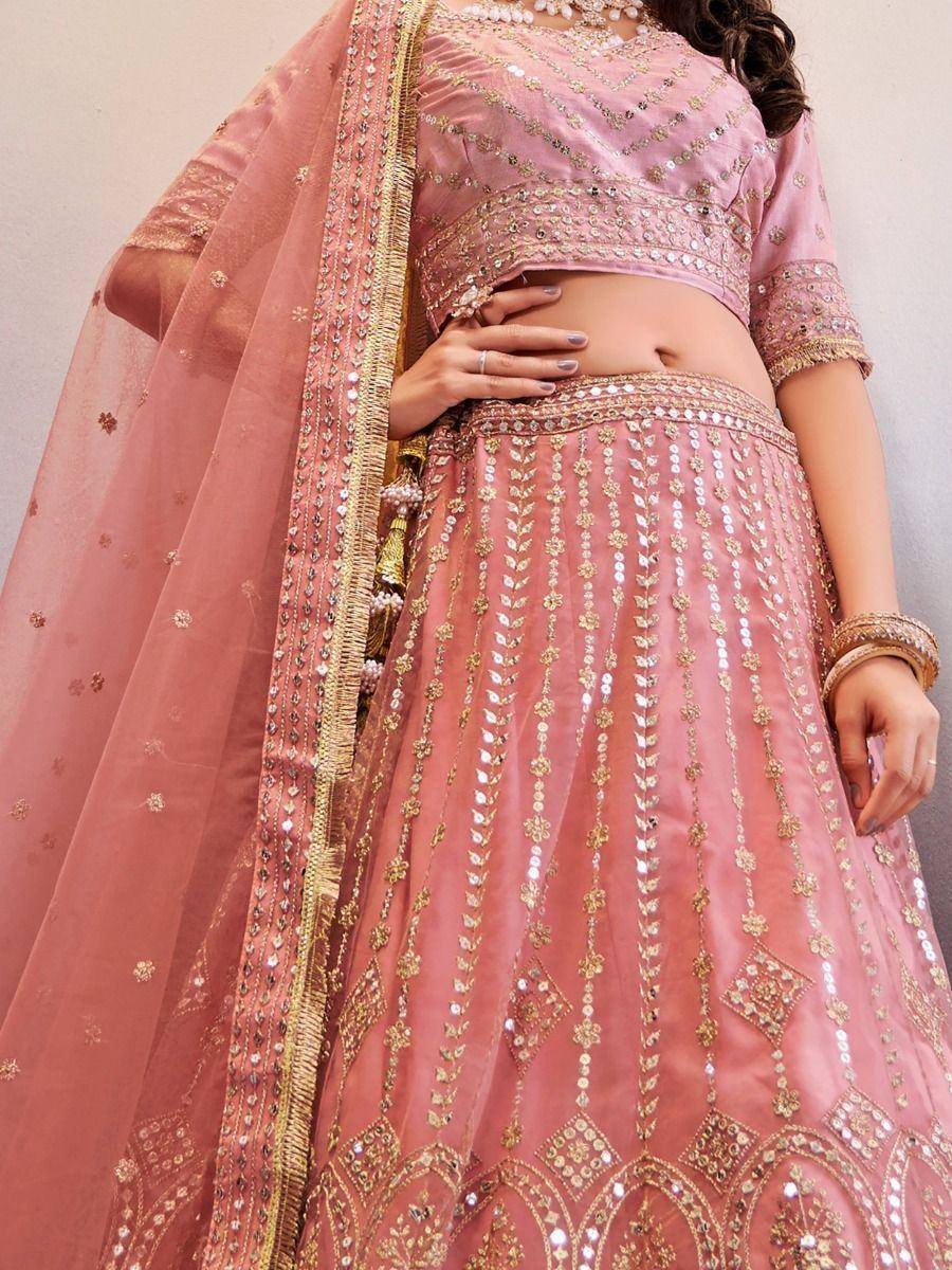 Pink designer lehenga choli with gold embroidery and sequins, perfect for Indian ethnic wear occasions
