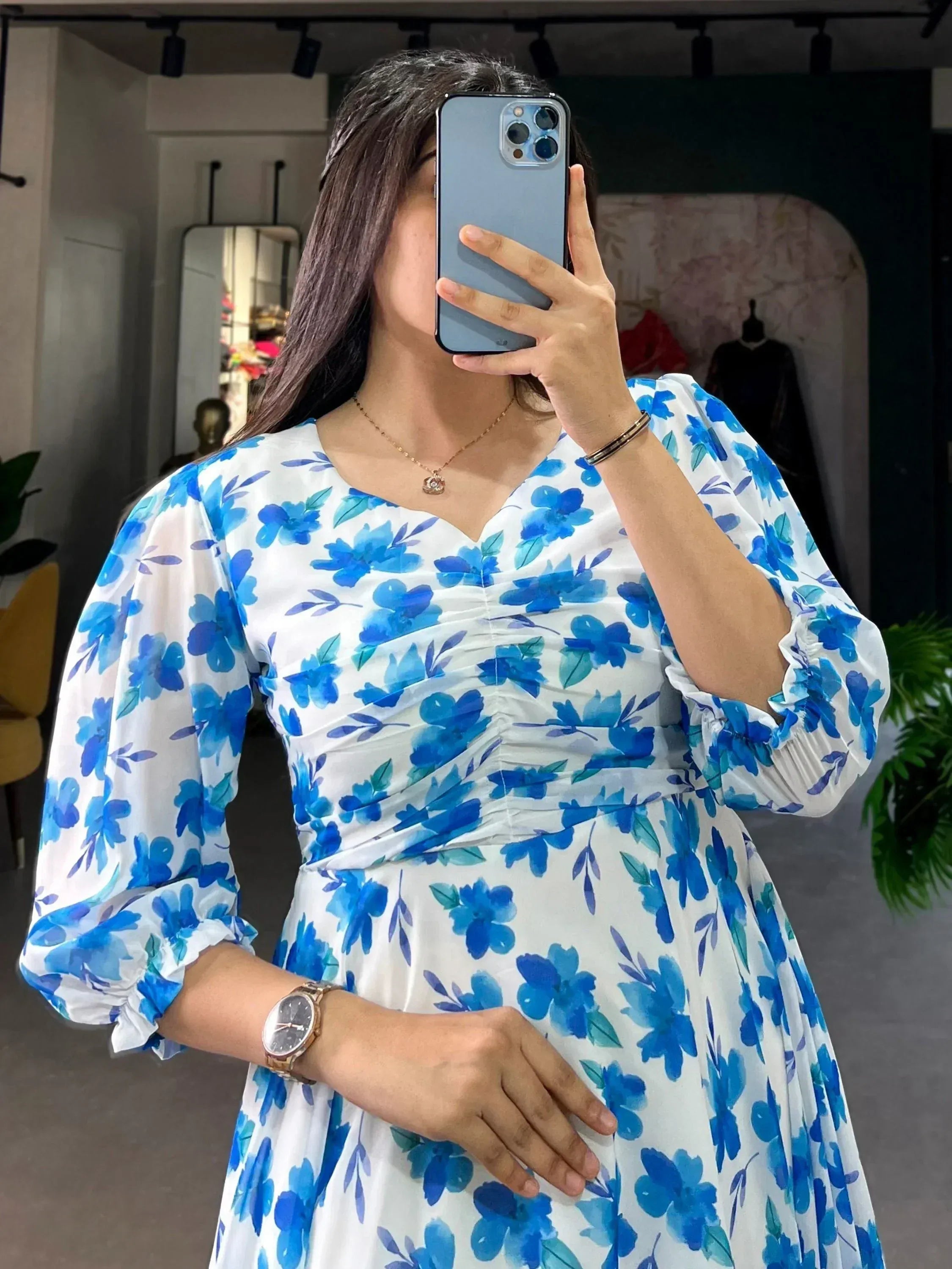 Blue floral print ethnic gown with puff sleeves, perfect for Indian occasions and parties