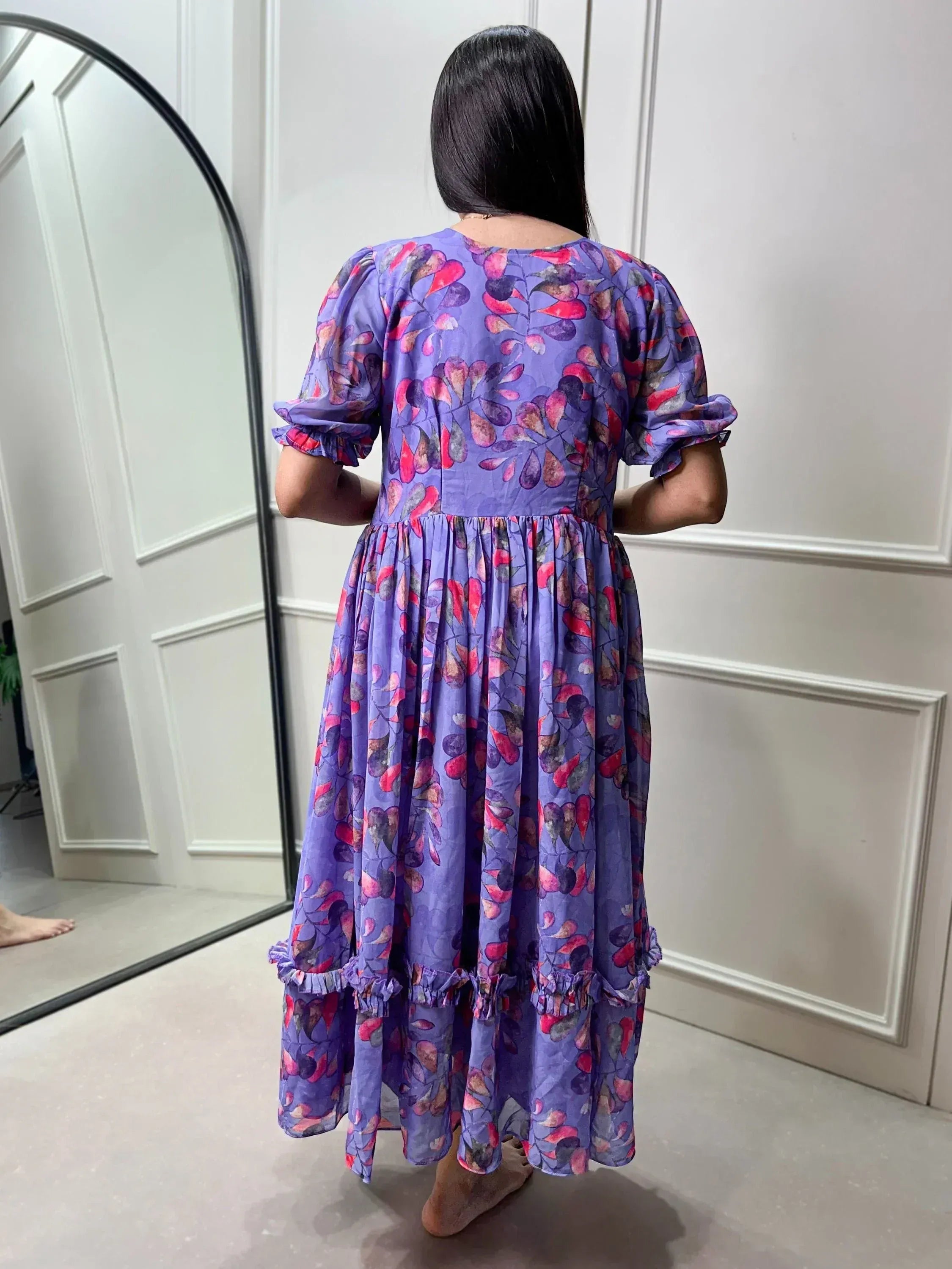 Purple floral ethnic gown with puff sleeves and ruffle hem, back view