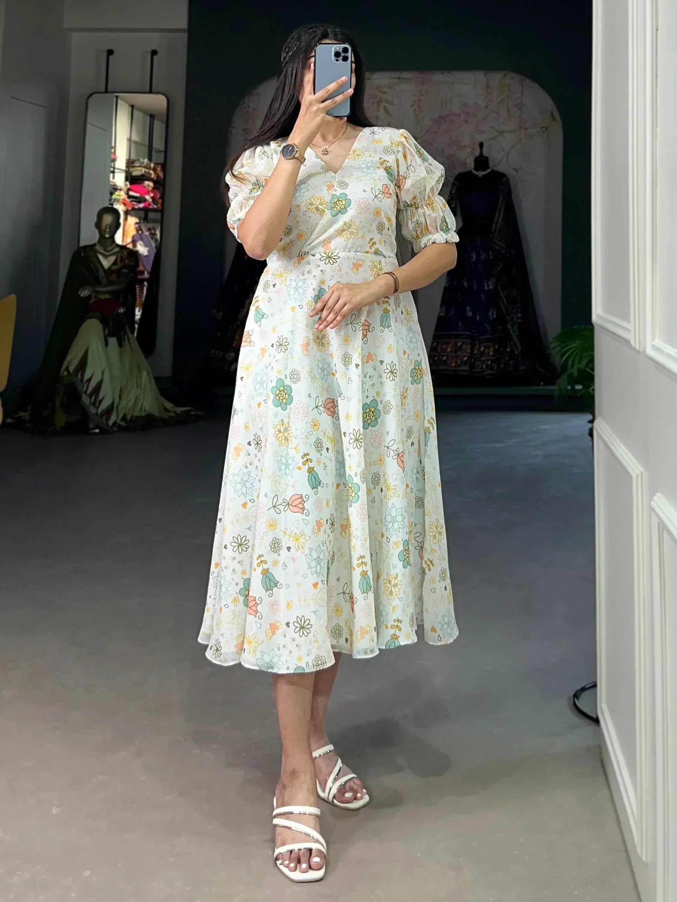 Floral print ethnic gown with puff sleeves, perfect for casual or semi-formal occasions.