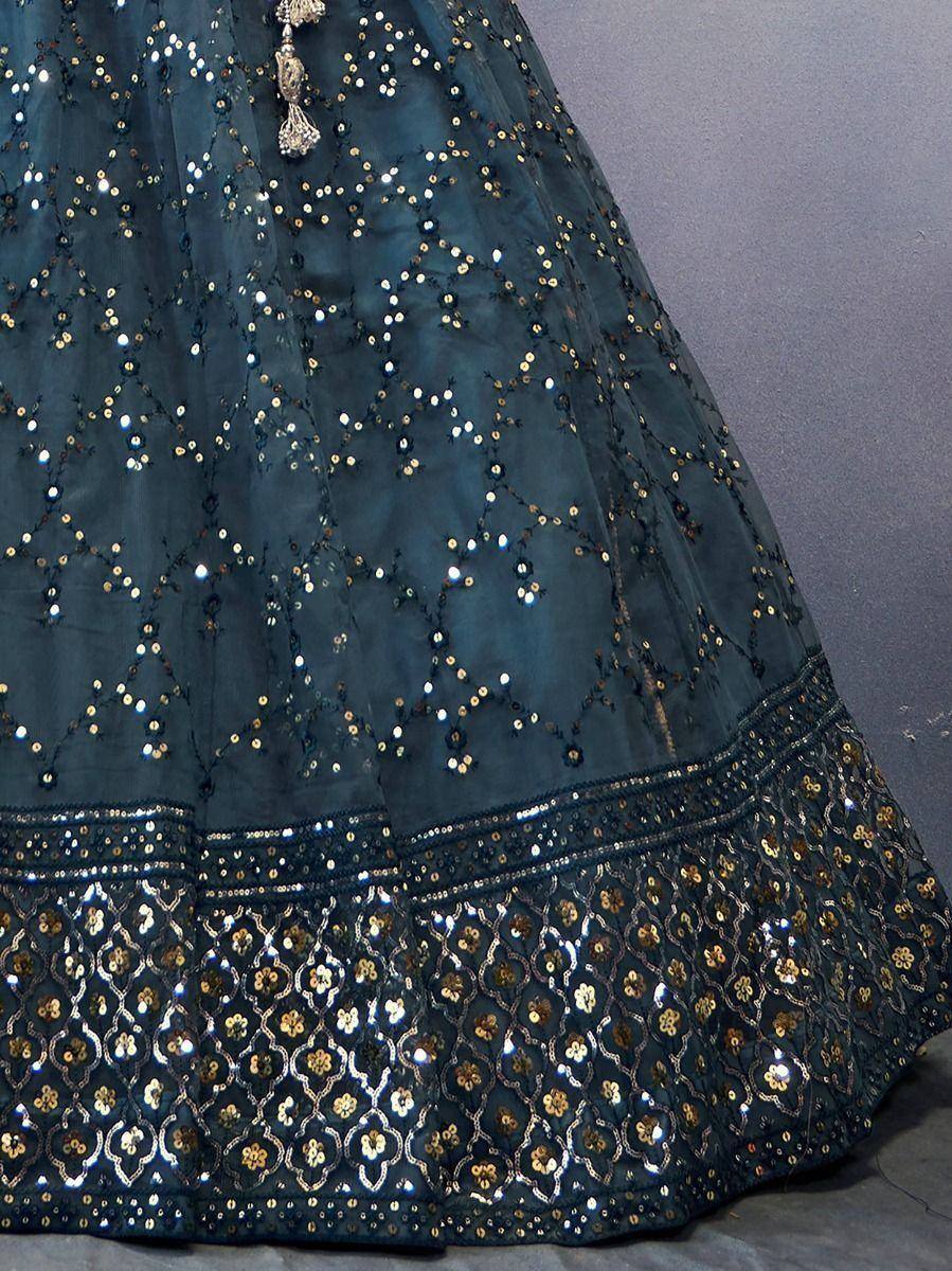 Dark teal lehenga with gold and silver sequin embroidery, floral border detail
