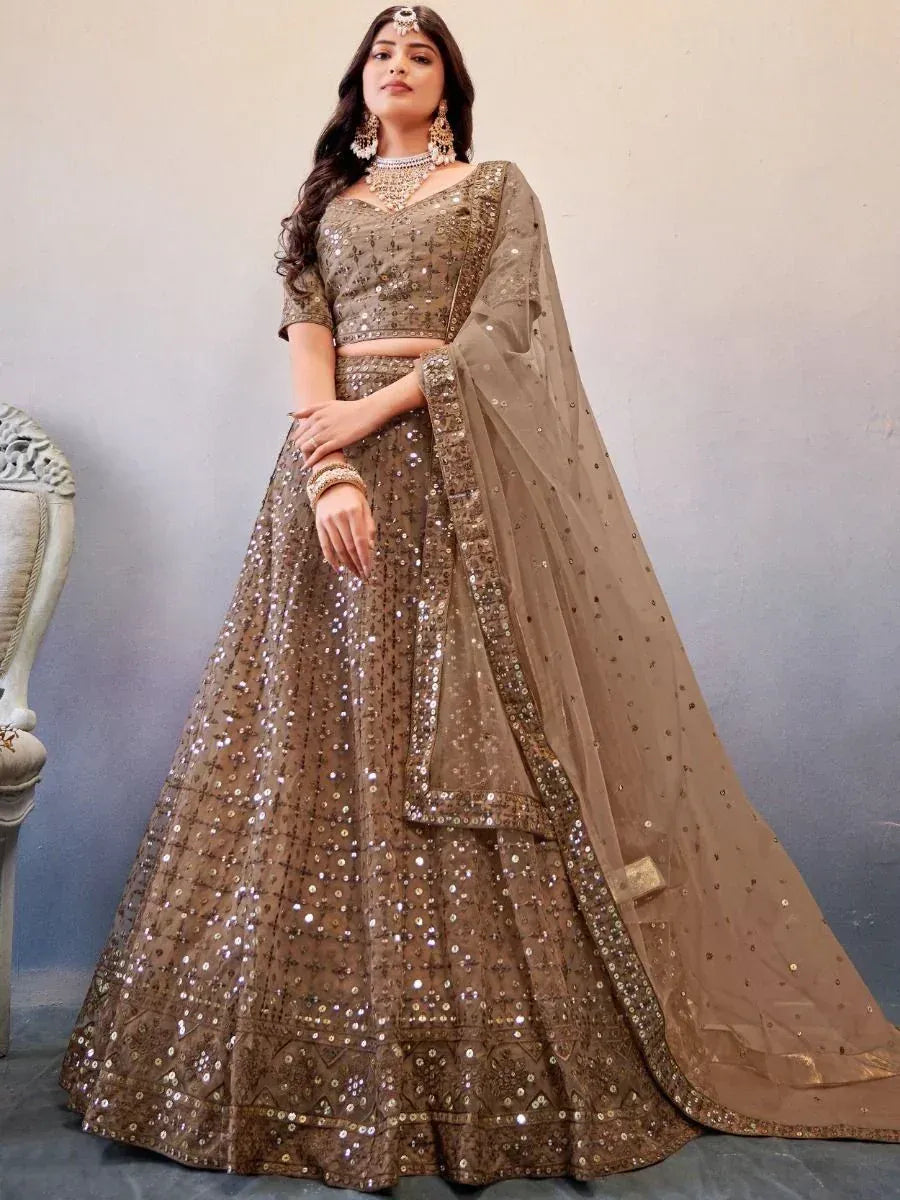 Elegant brown sequin lehenga choli with matching dupatta, perfect for Indian weddings and festive occasions.