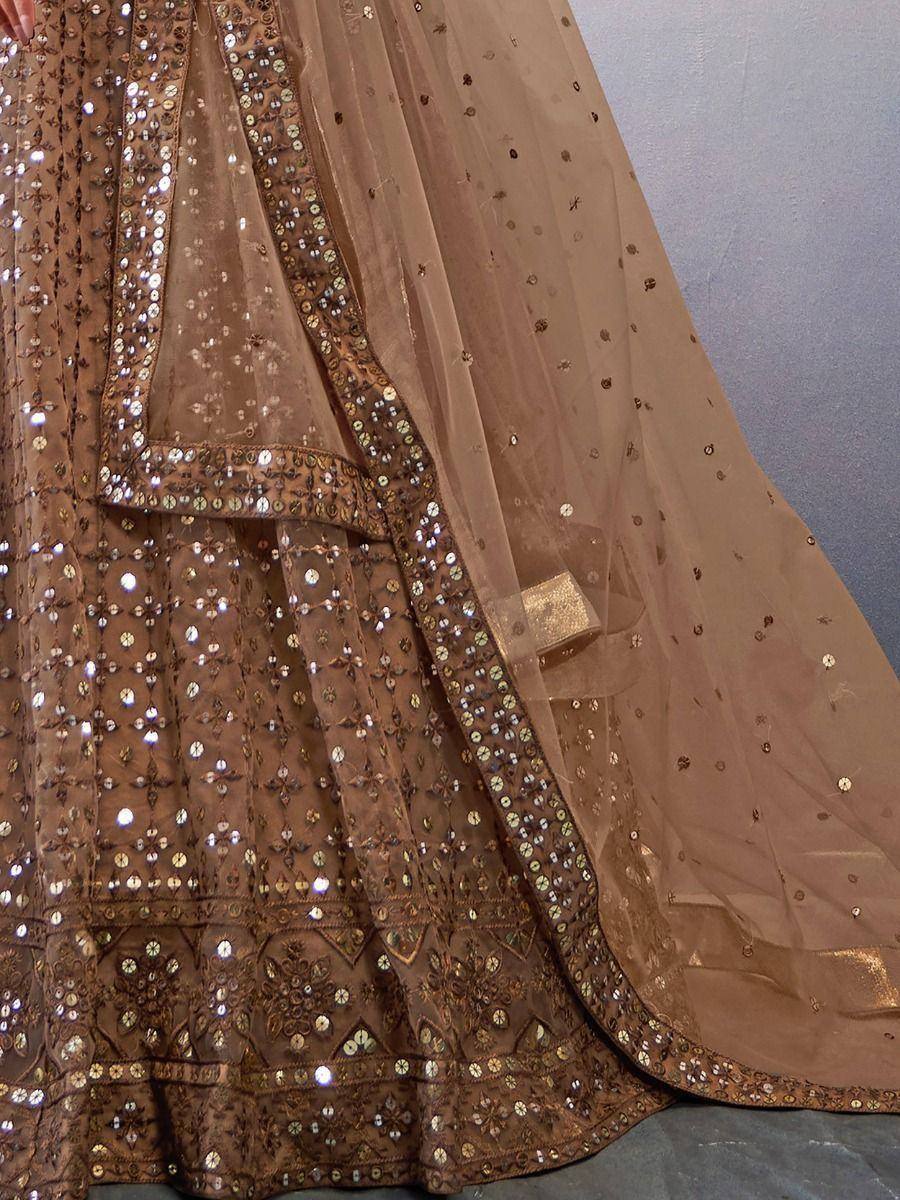 Brown sequin-embellished lehenga choli with sheer dupatta, ethnic Indian wedding wear