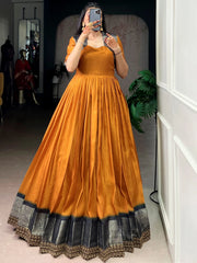 Incredible Mustard Yellow Zari Weaving Silk Function Wear Gown